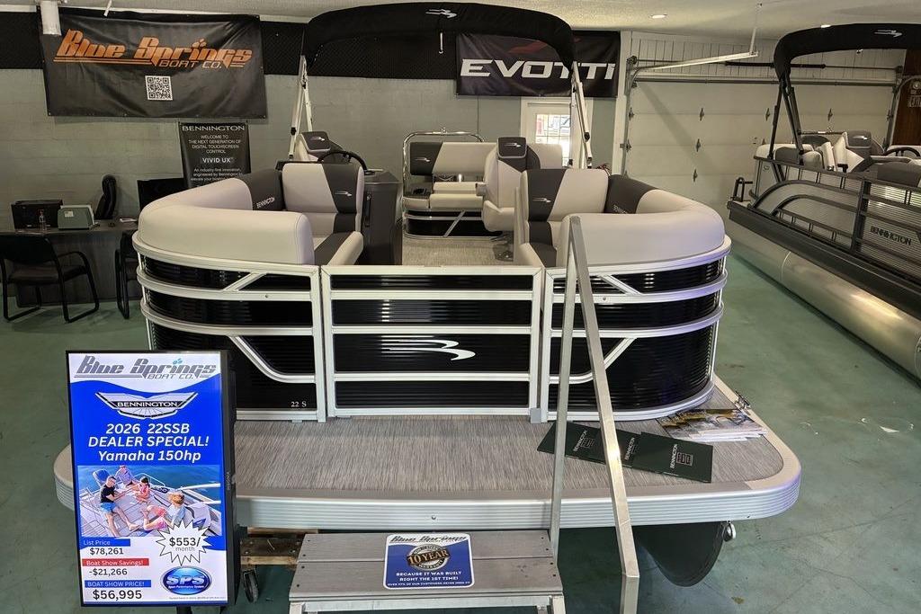 2026 Bennington SWINGBACK 22 pontoon boat on display at Blue Brothers Boat Co. showroom.