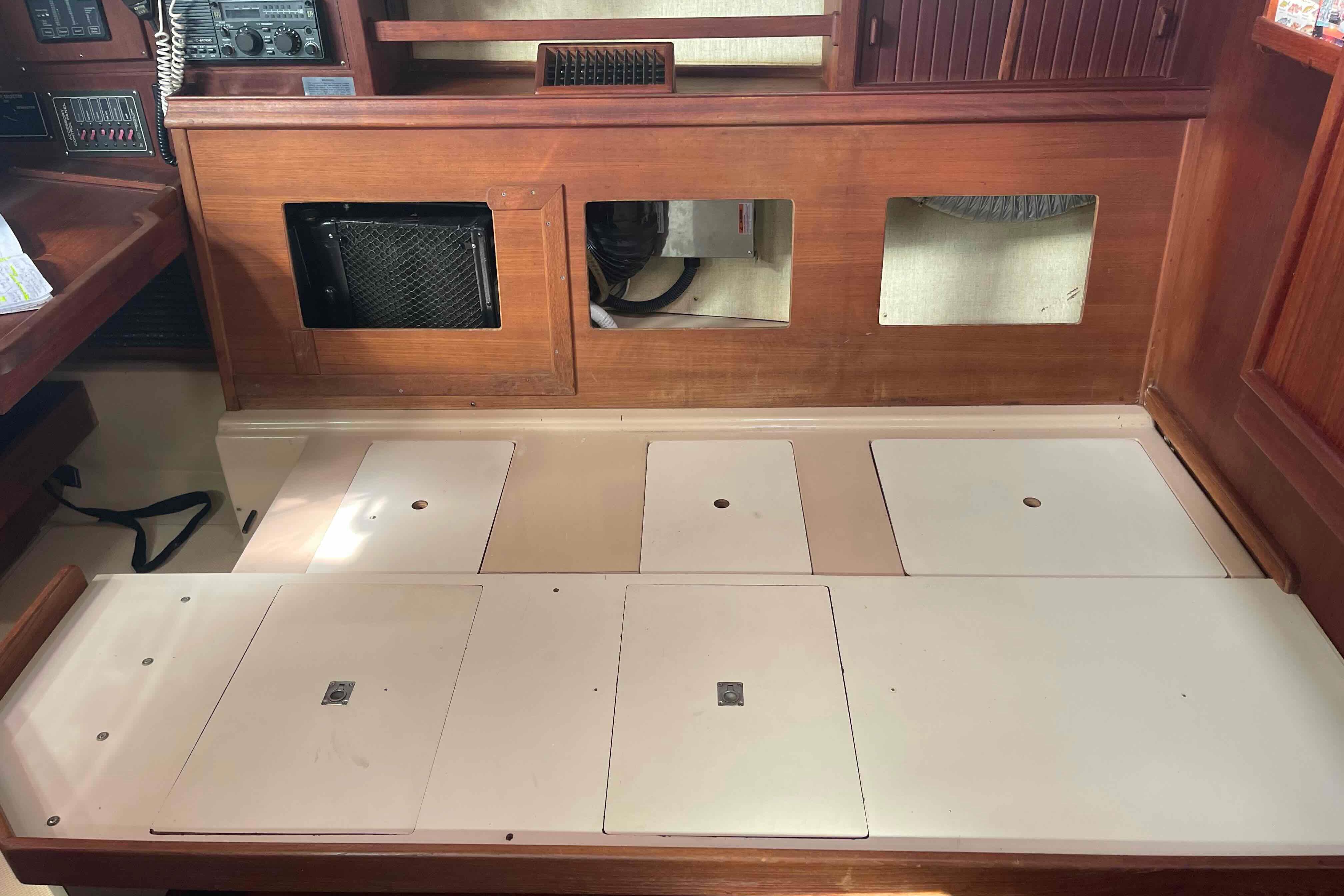 Interior view of 1989 Island Packet 35 sailboat with storage compartments.