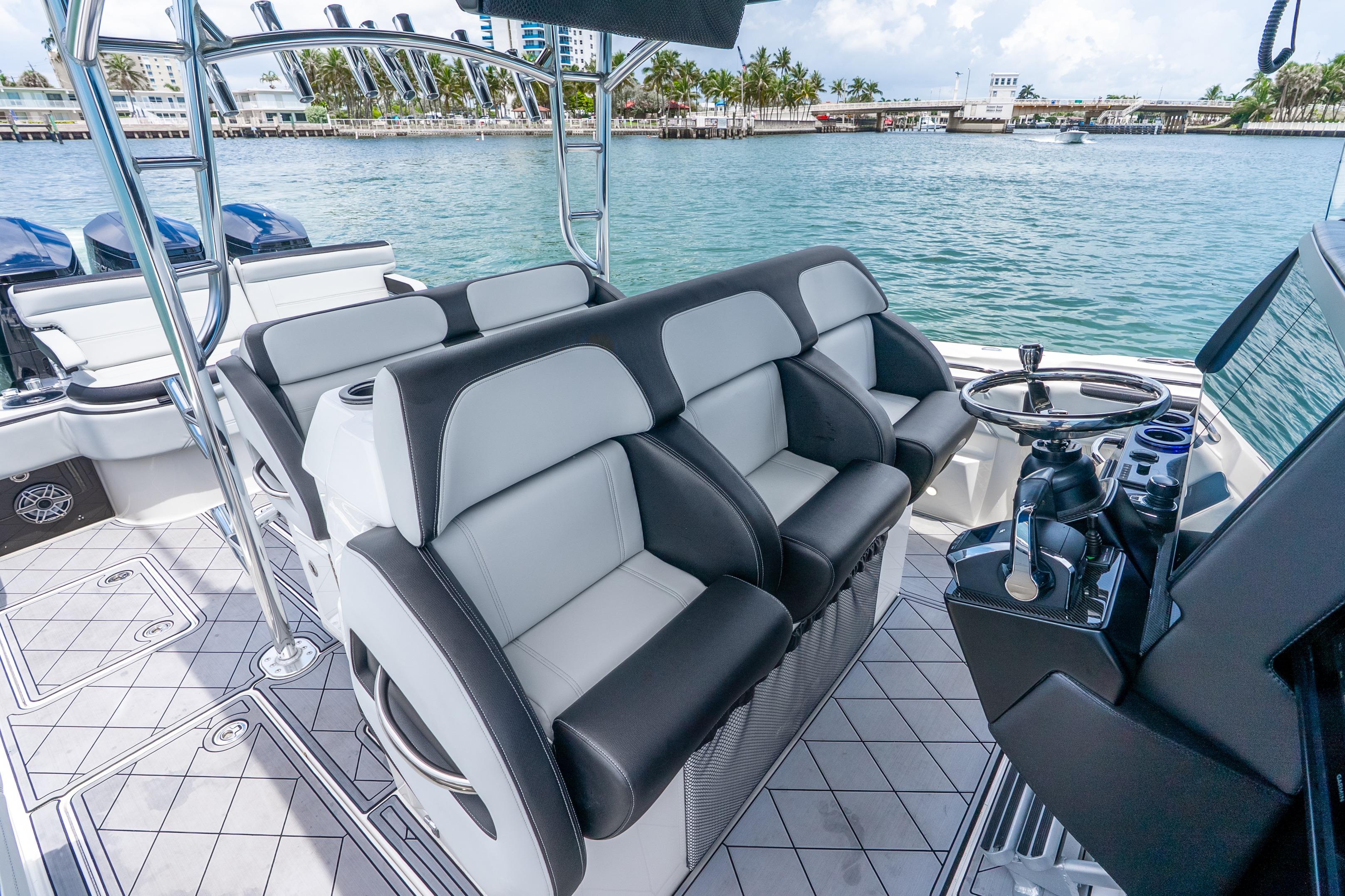2024 Nor-Tech 452 Super Fish boat interior with luxurious seating and modern steering console.