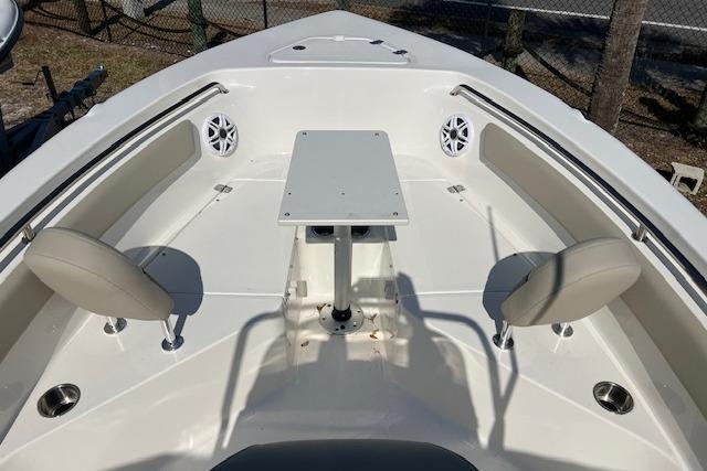 2026 Key West 203 FS boat interior with seating and table, featuring modern design elements.
