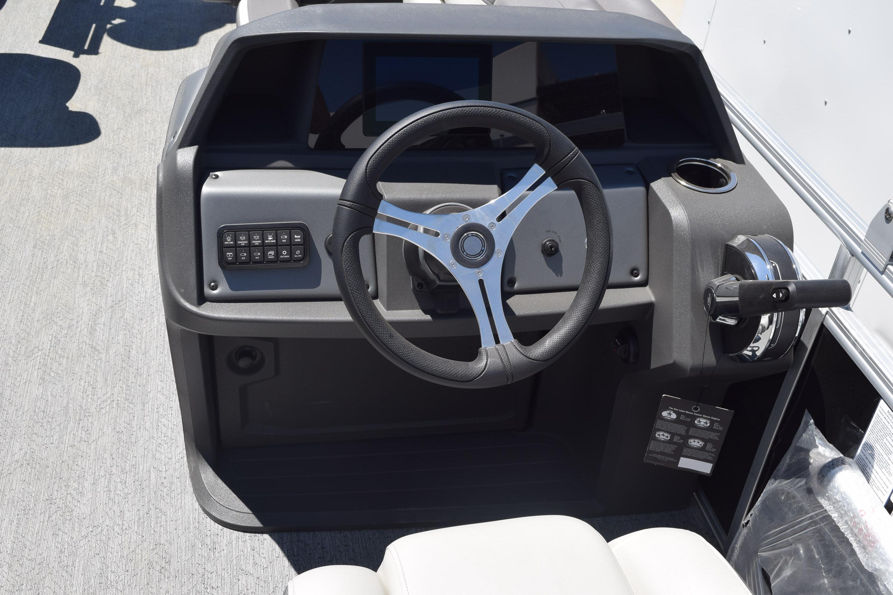 Steering console of 2026 Sun Tracker Fishin' Barge 20 DLX pontoon boat.