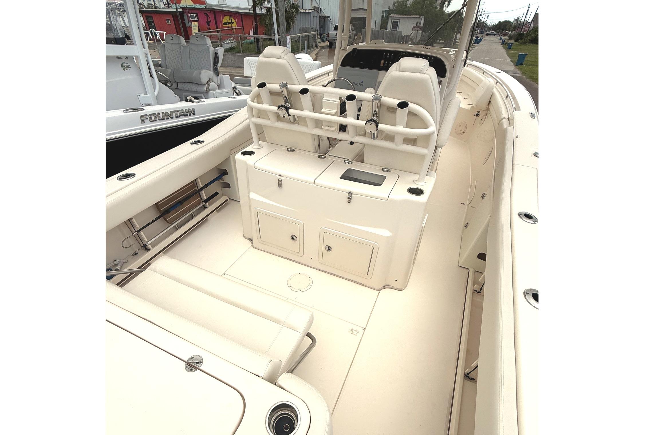 2018 Grady-White Canyon 306 boat interior with seating and storage compartments.