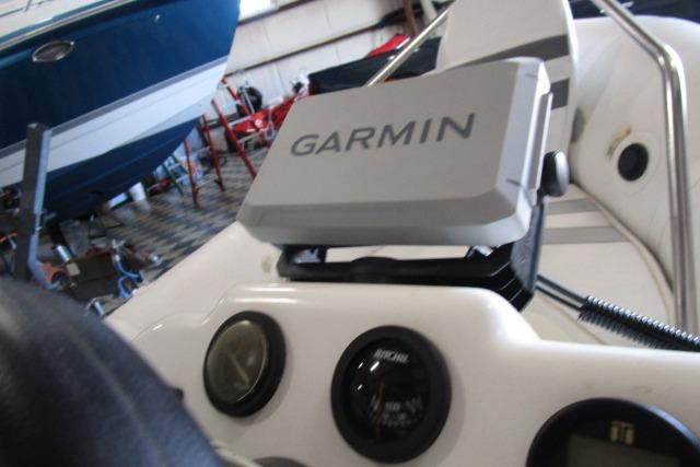 Console of 2000 Zodiac Yachtline 340DL with Garmin navigation system.