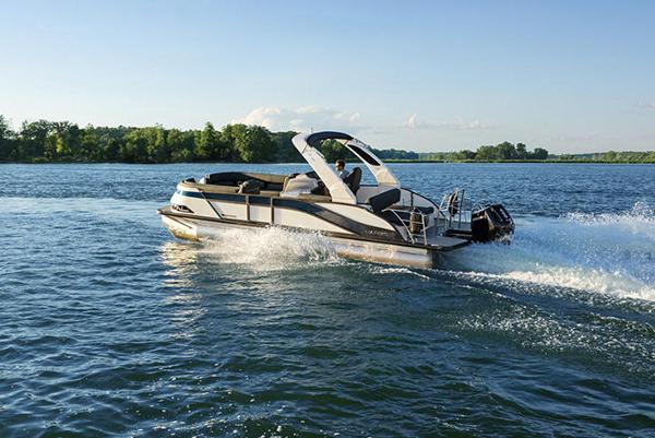 Manufacturer Provided Image: Manufacturer Provided Image: 2025 Harris Grand Mariner 250 cruising on a serene lake.