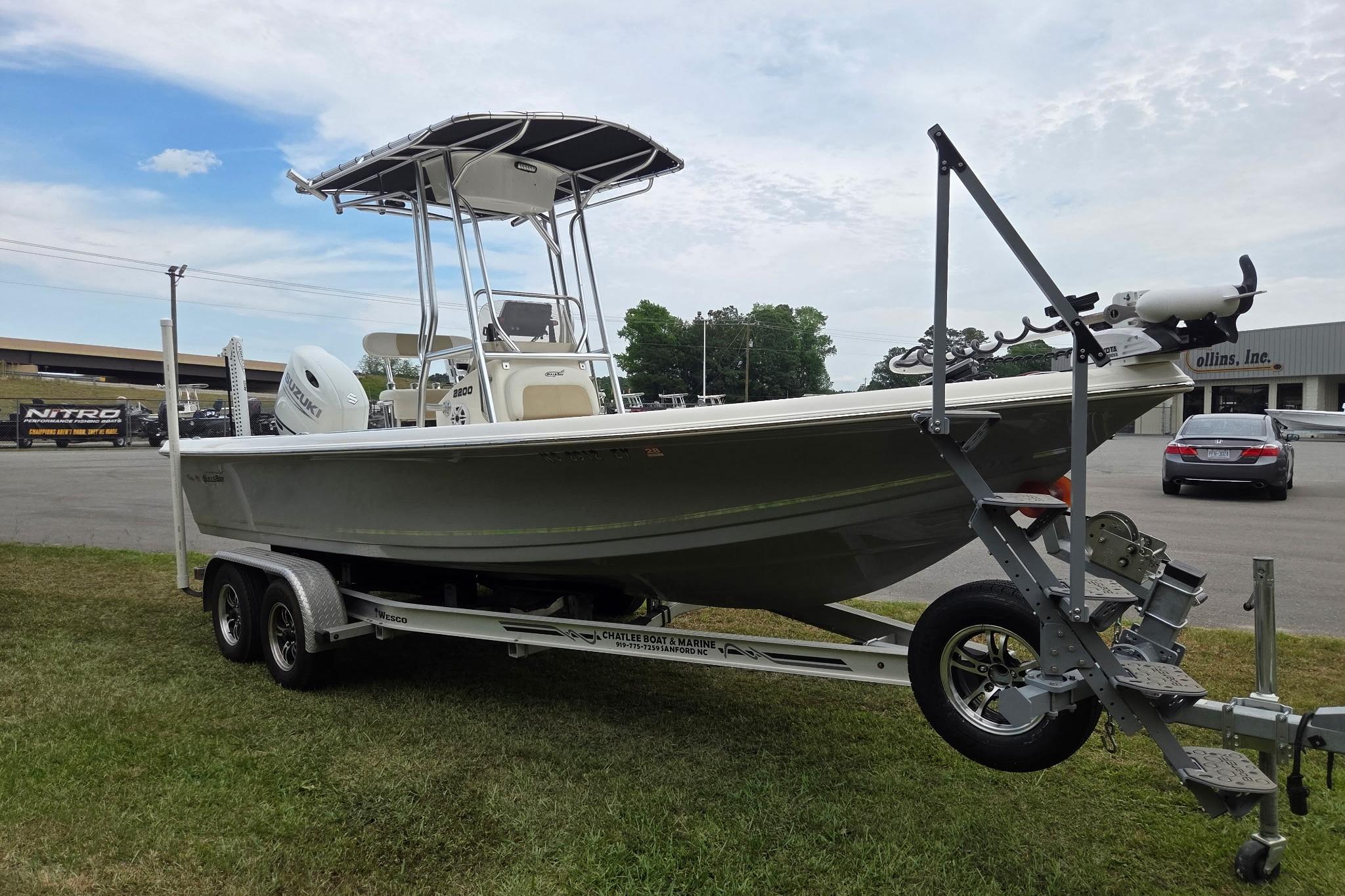 2023 Bulls Bay 2200 boat on trailer, parked outdoors, showcasing sleek design and modern features.