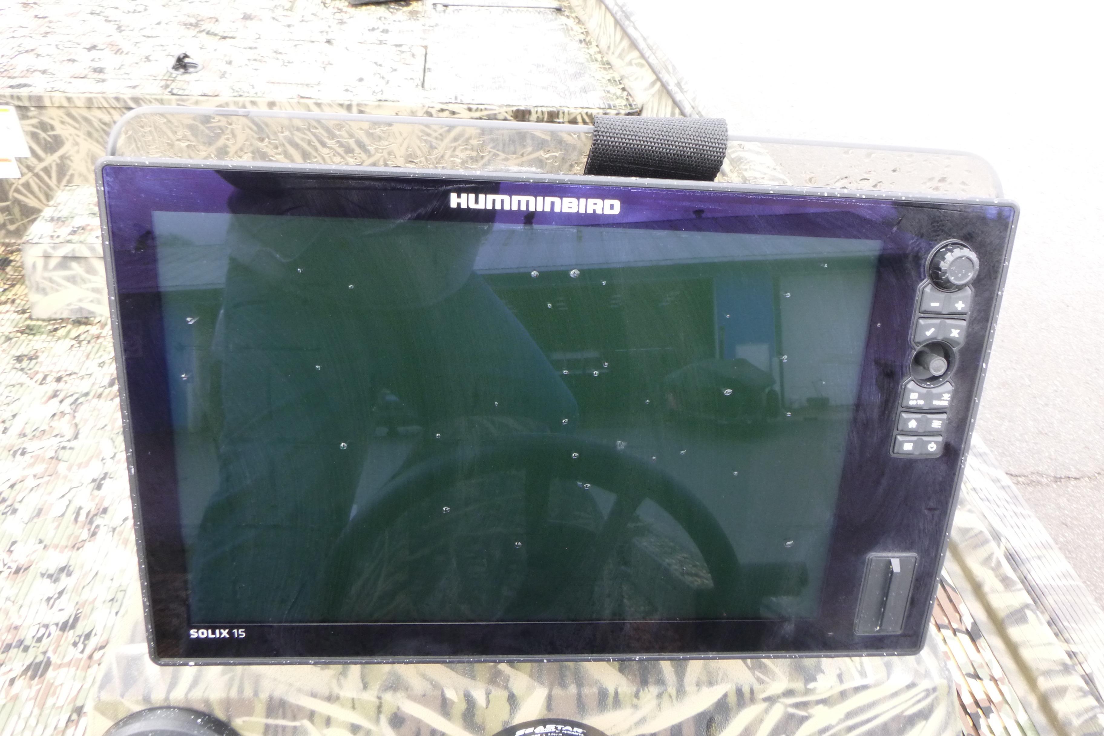 Humminbird Solix 15 fish finder on 2024 Lowe Roughneck 2070 boat dashboard.