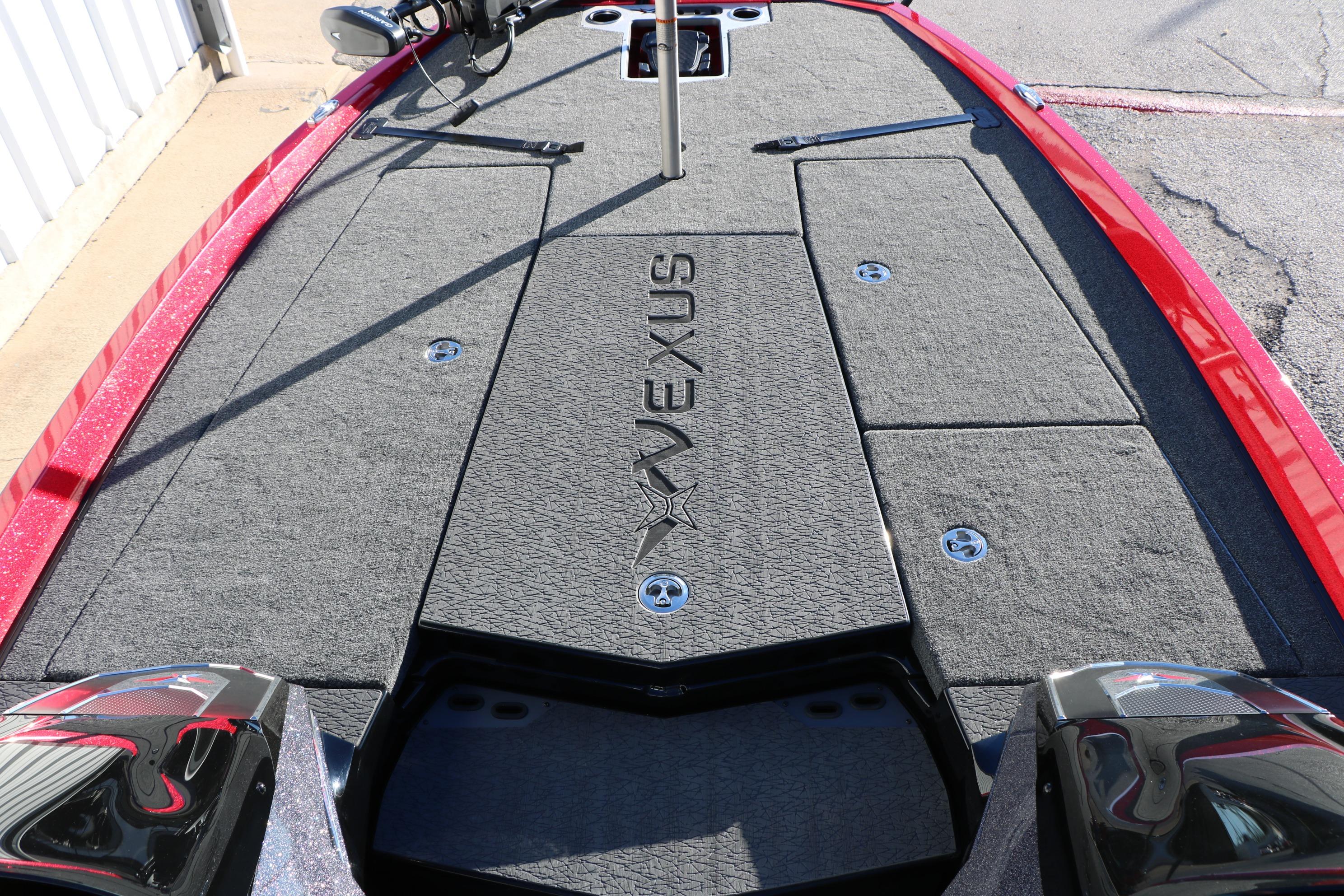 2026 Vexus VXs21 boat deck with gray carpet and storage compartments.