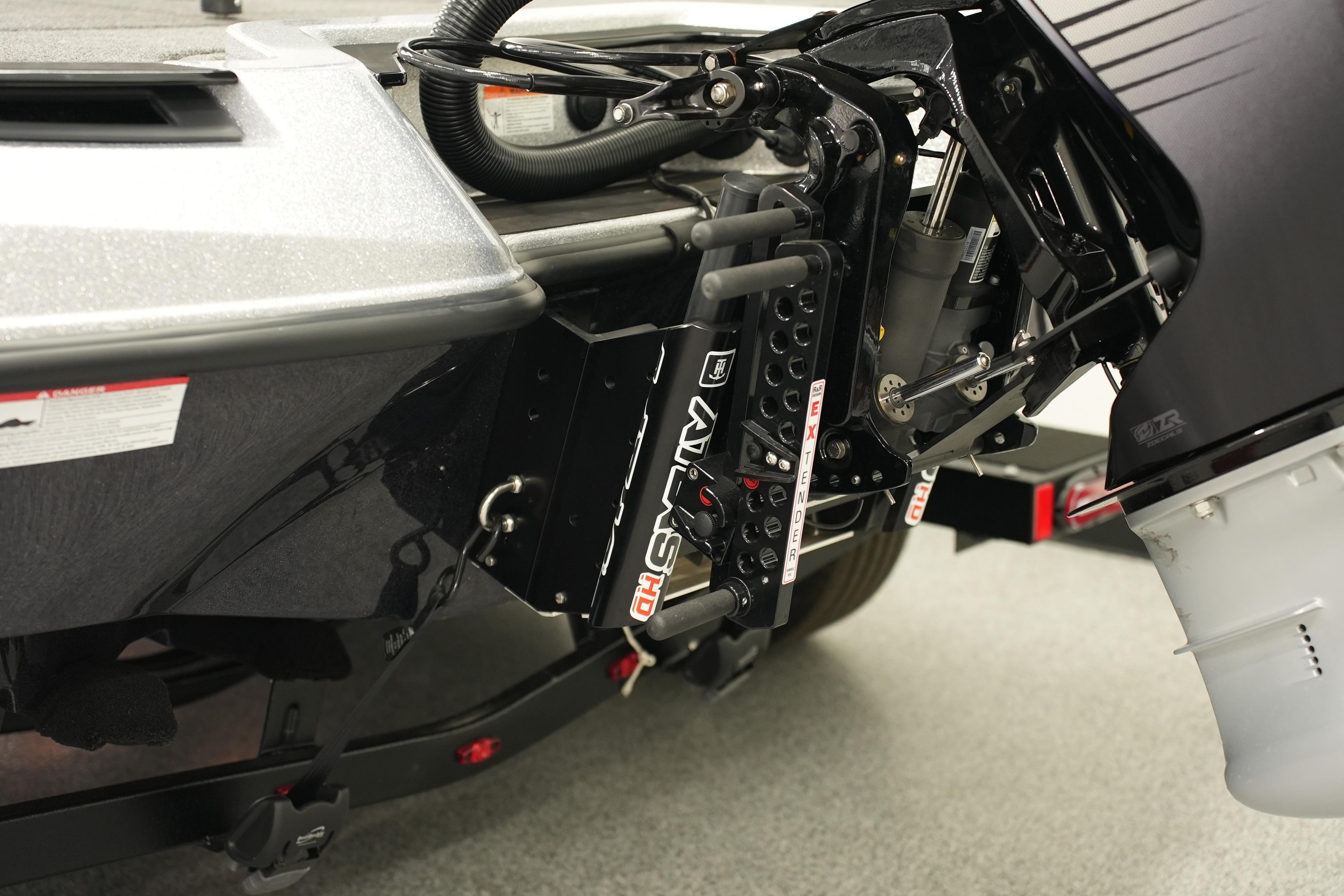 Close-up of iKon LXE20 2026 boat engine and hydraulic system components.