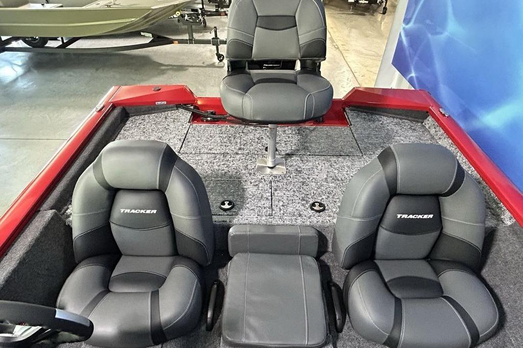 2026 Tracker Pro Team 195 boat interior with gray seating and red accents.