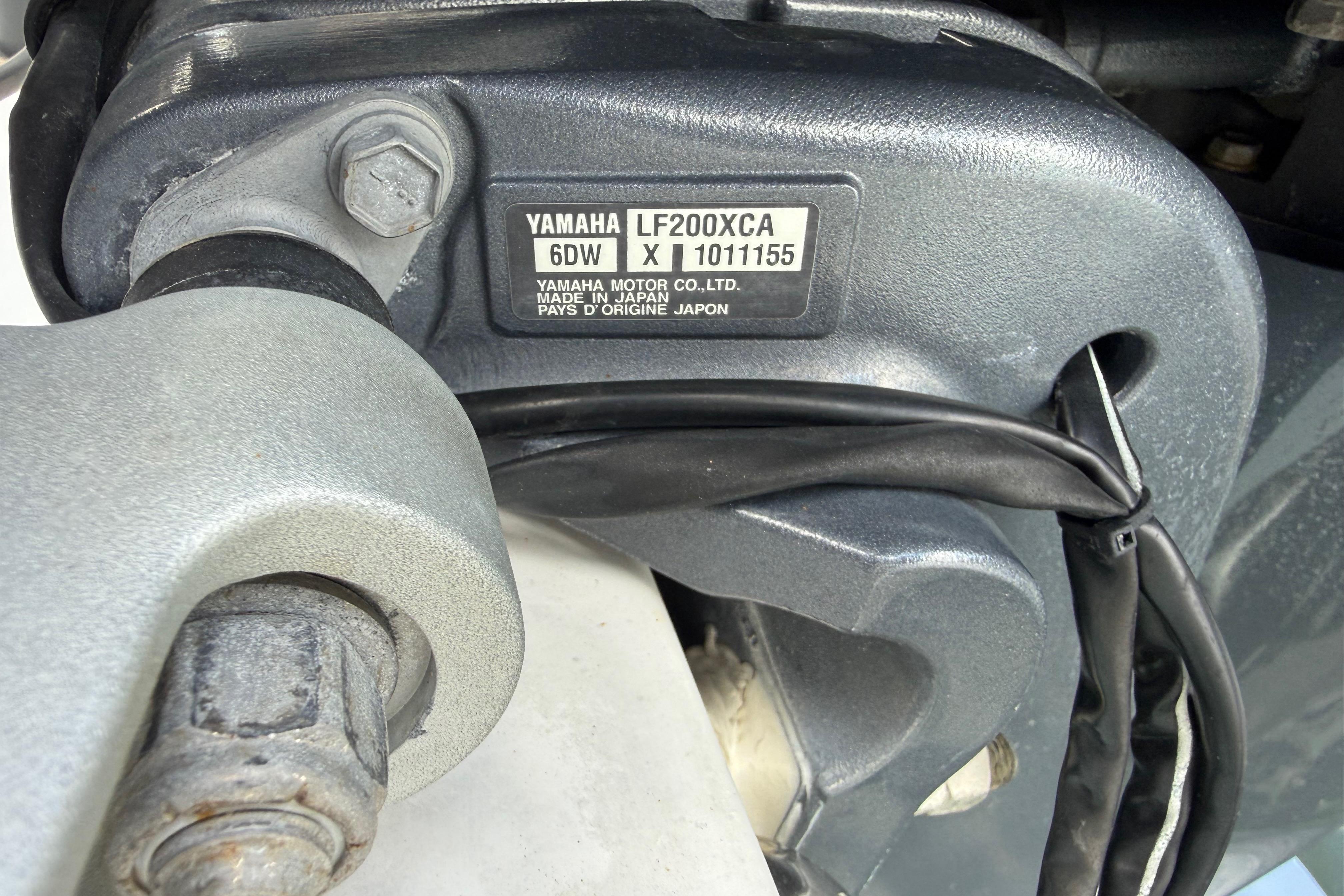 Close-up of Yamaha LF200XCA engine part on 2022 Century 2600 Center Console boat.
