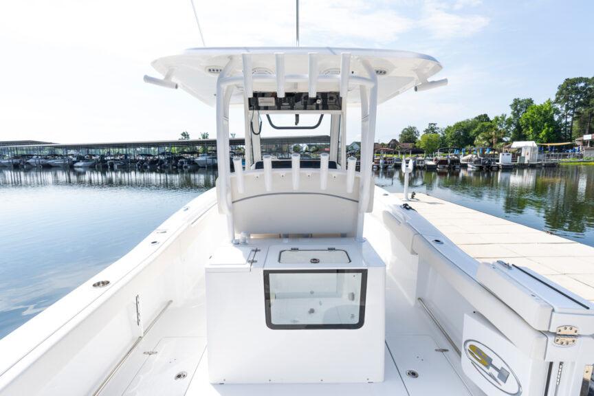 Manufacturer Provided Image: 2026 Sea Hunt Gamefish 30 Coffin Box boat docked by a serene marina.