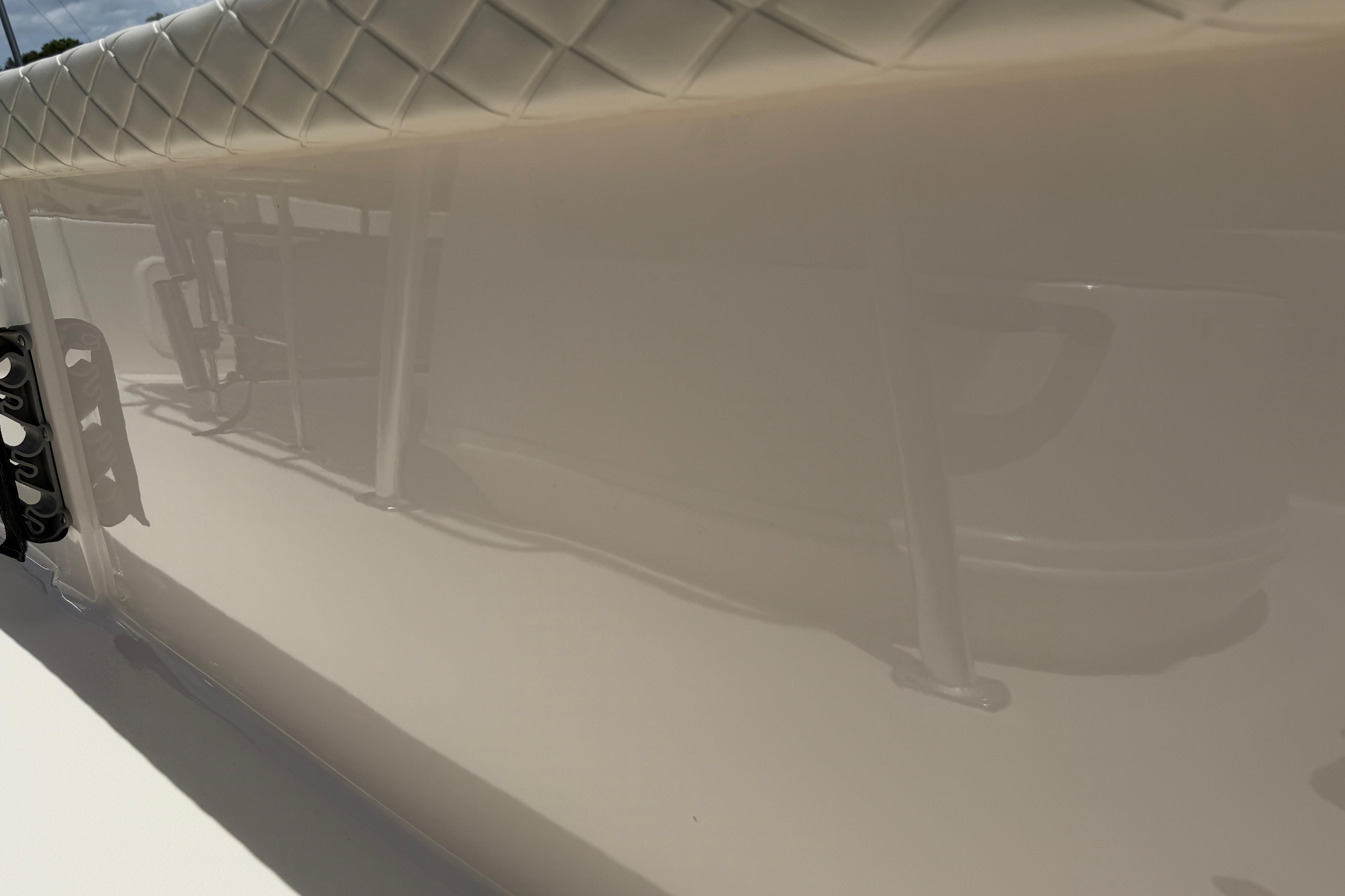 2023 Carolina Skiff 21 LS boat interior with quilted upholstery detail.