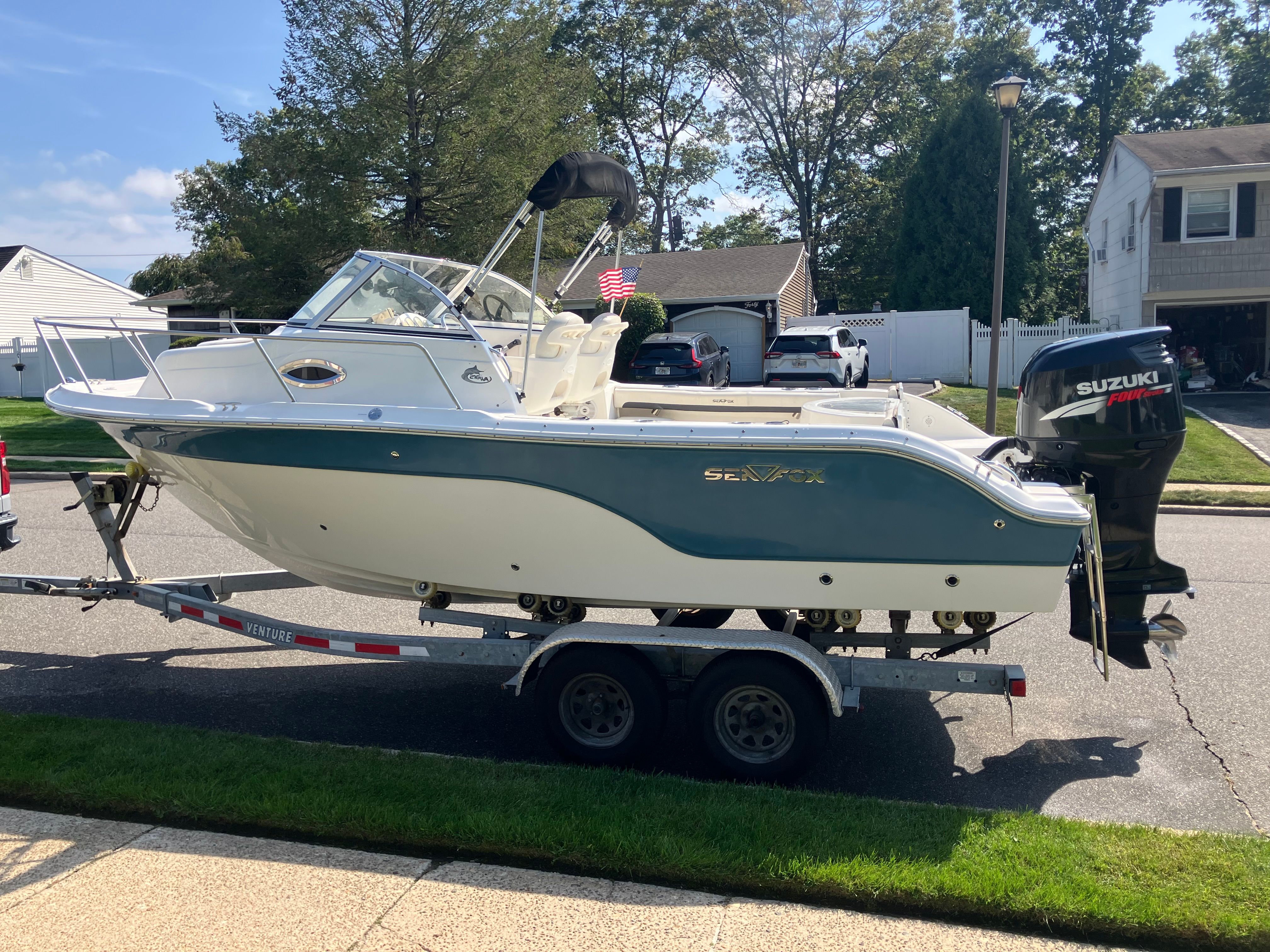 Custom 216wa pro boat from 2010 on trailer, Suzuki engine.