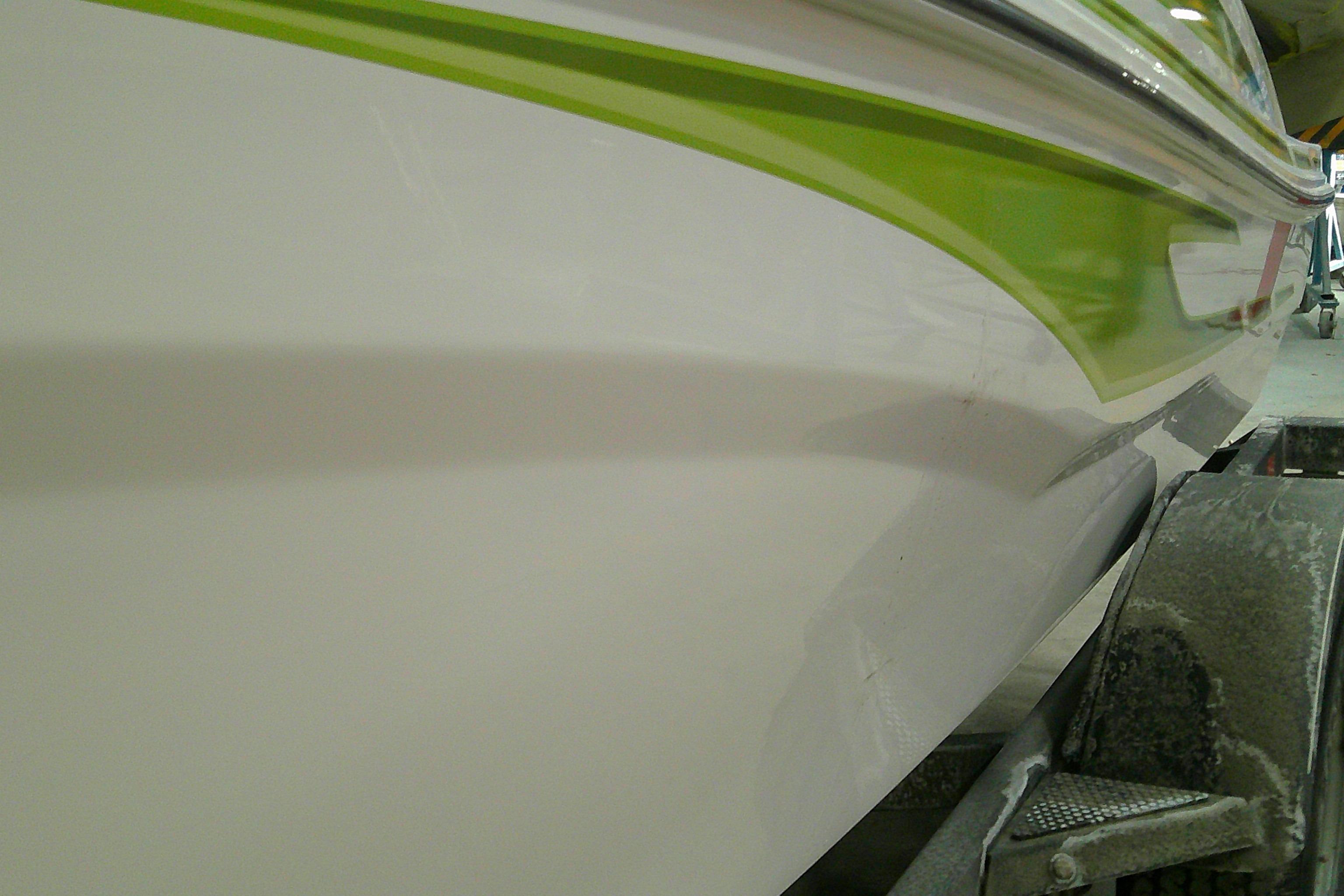 2023 Tahoe T18 boat with green stripe detail on trailer.