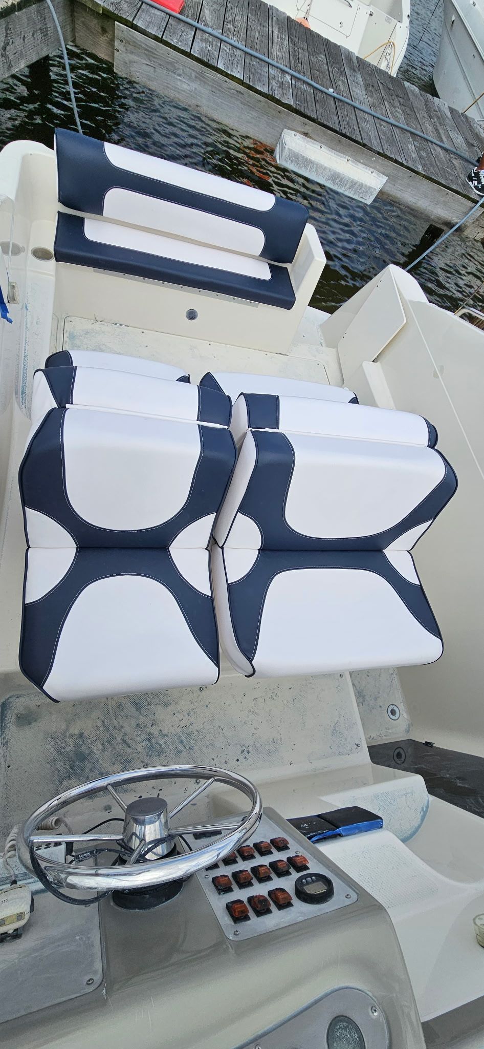 The image shows the cockpit of a 1995 MerCruiser Sc2400 with modern seating.