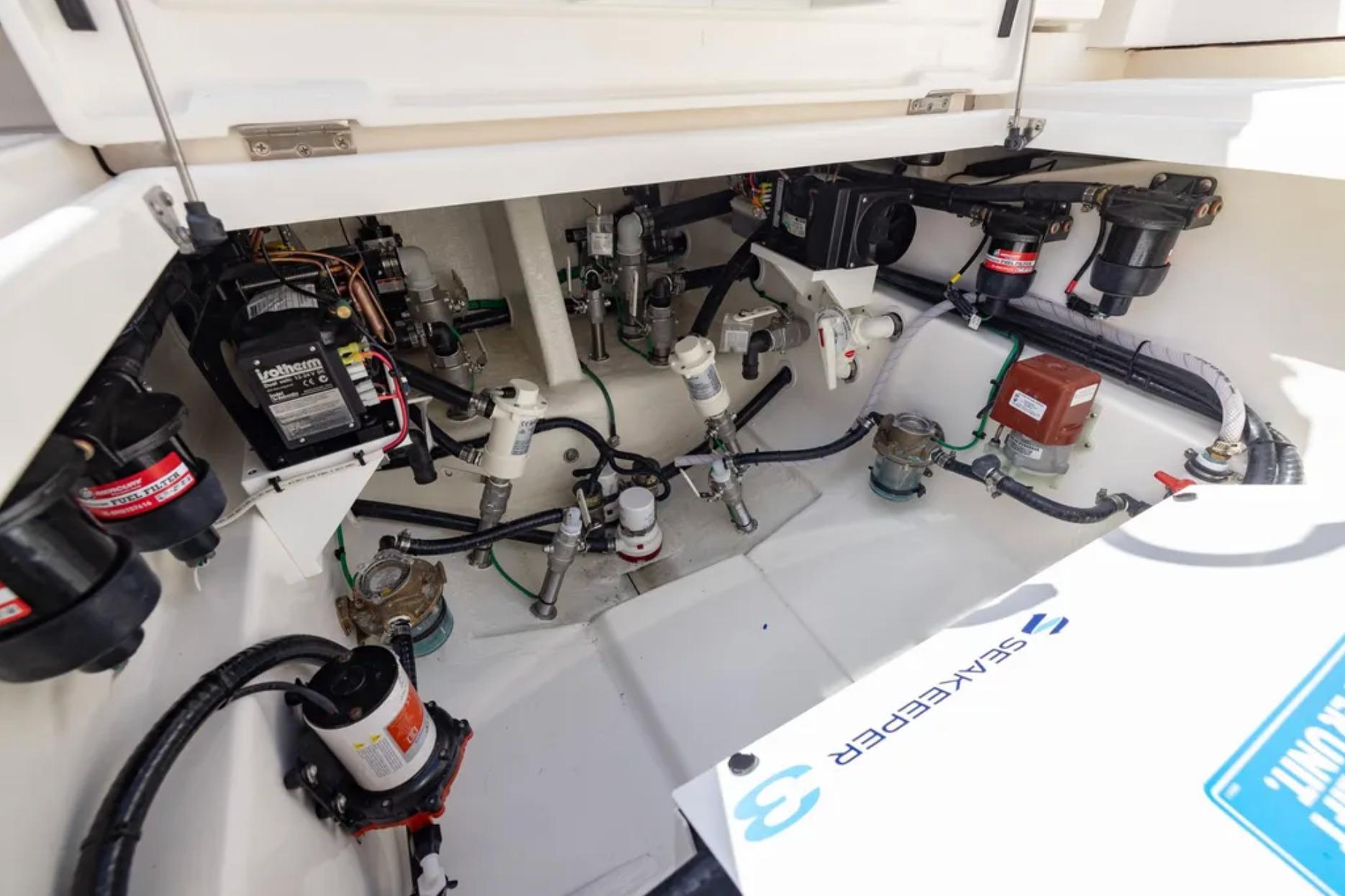 Engine compartment of 2025 Blackwater 41 Performance Fish boat, showcasing mechanical components.