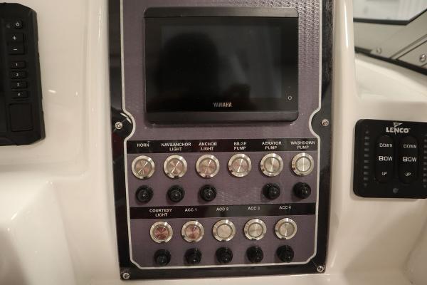 Control panel of 2025 Sea Fox 228 Traveler boat with Yamaha display and switches.