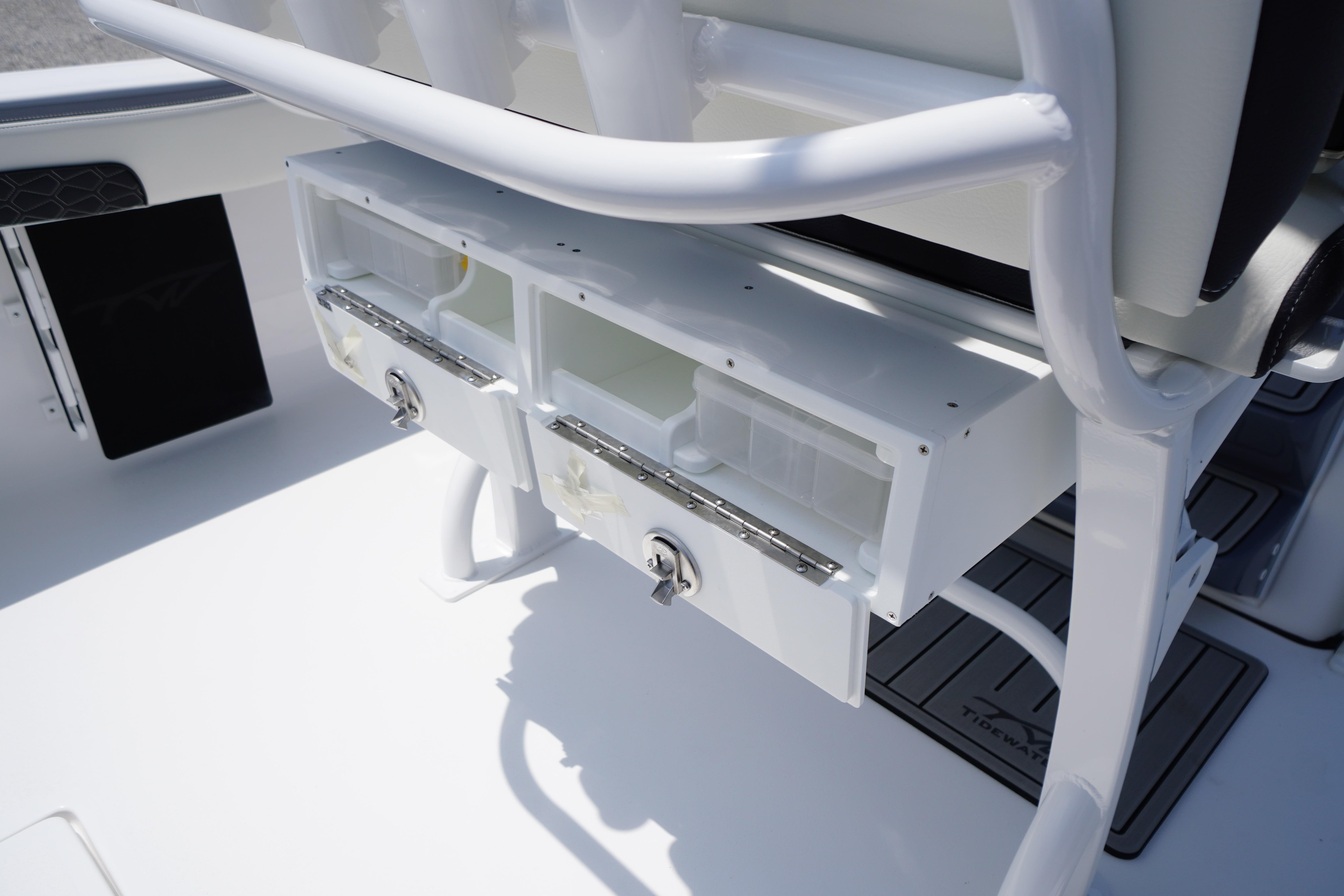 2027 Tidewater 220 CC Adventure boat storage compartments with secure latches.