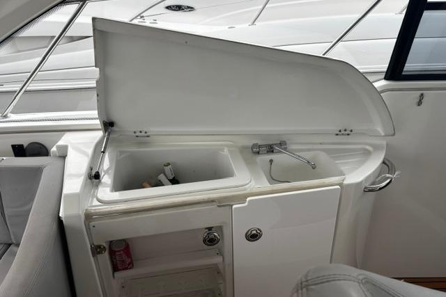2013 Beneteau Gran Turismo 38 yacht interior with open sink and storage area.