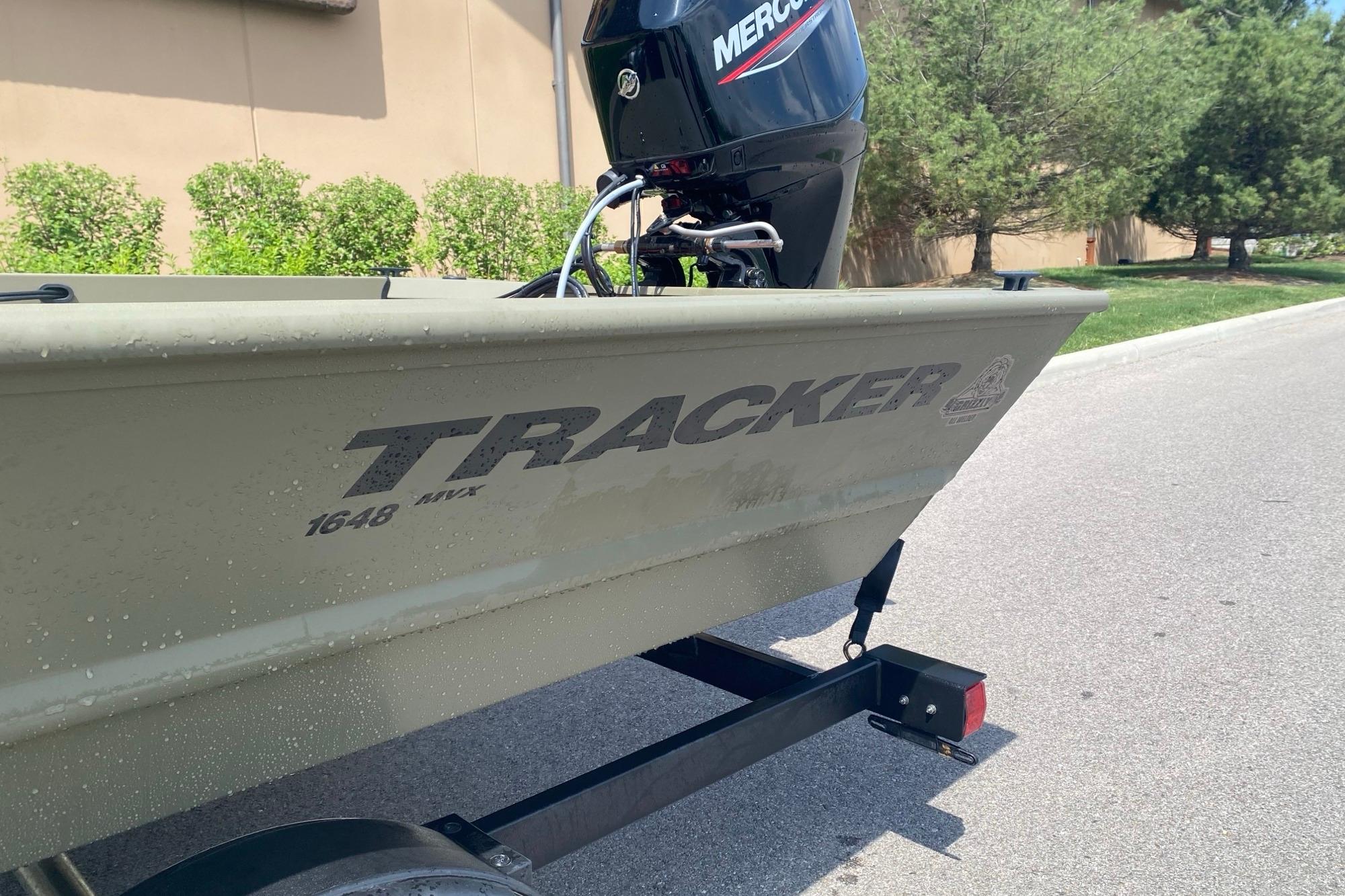 2026 Tracker Grizzly 1648 SC boat with Mercury engine on trailer.