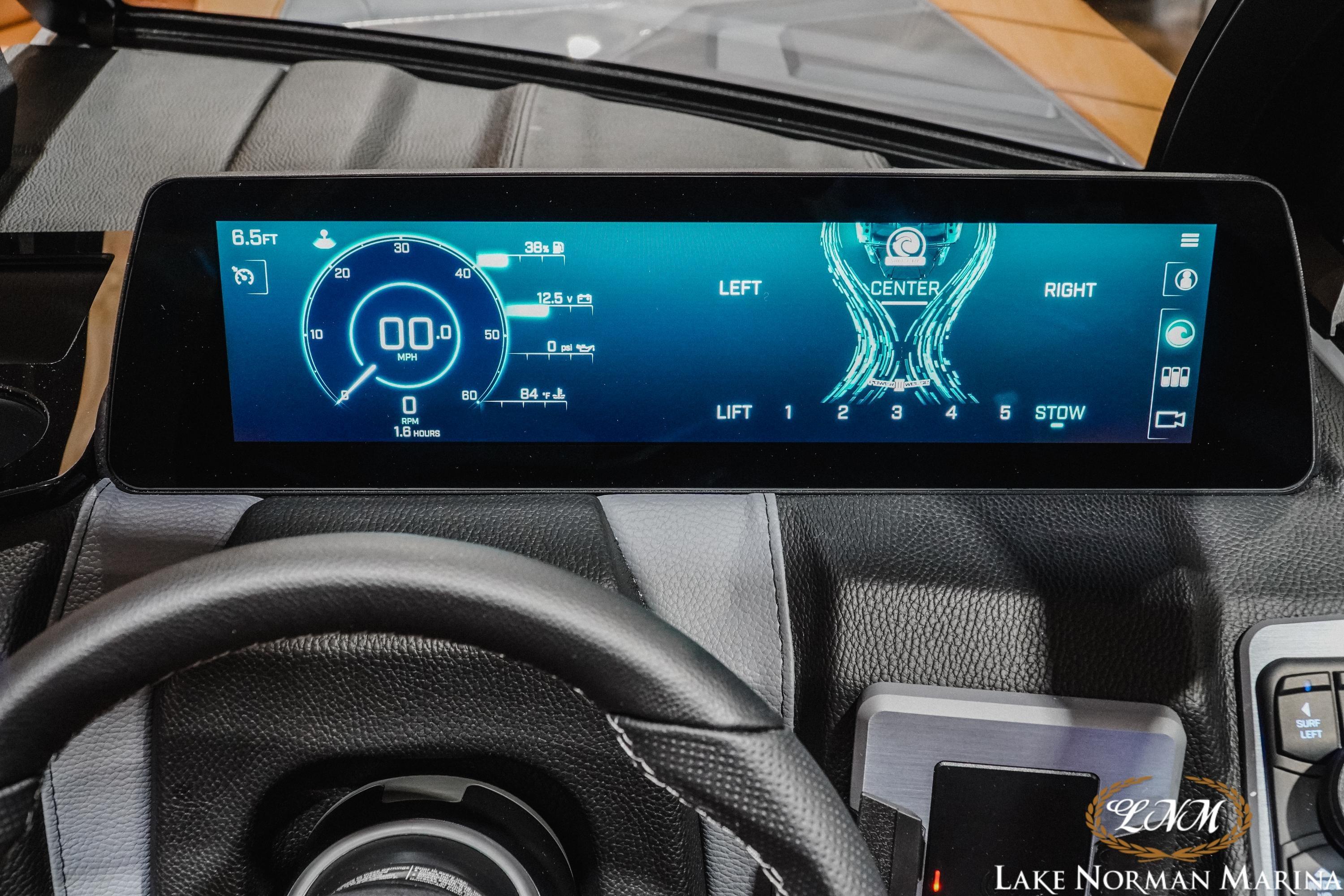 2026 Malibu Wakesetter 23 LSV dashboard display with digital speedometer and control settings.