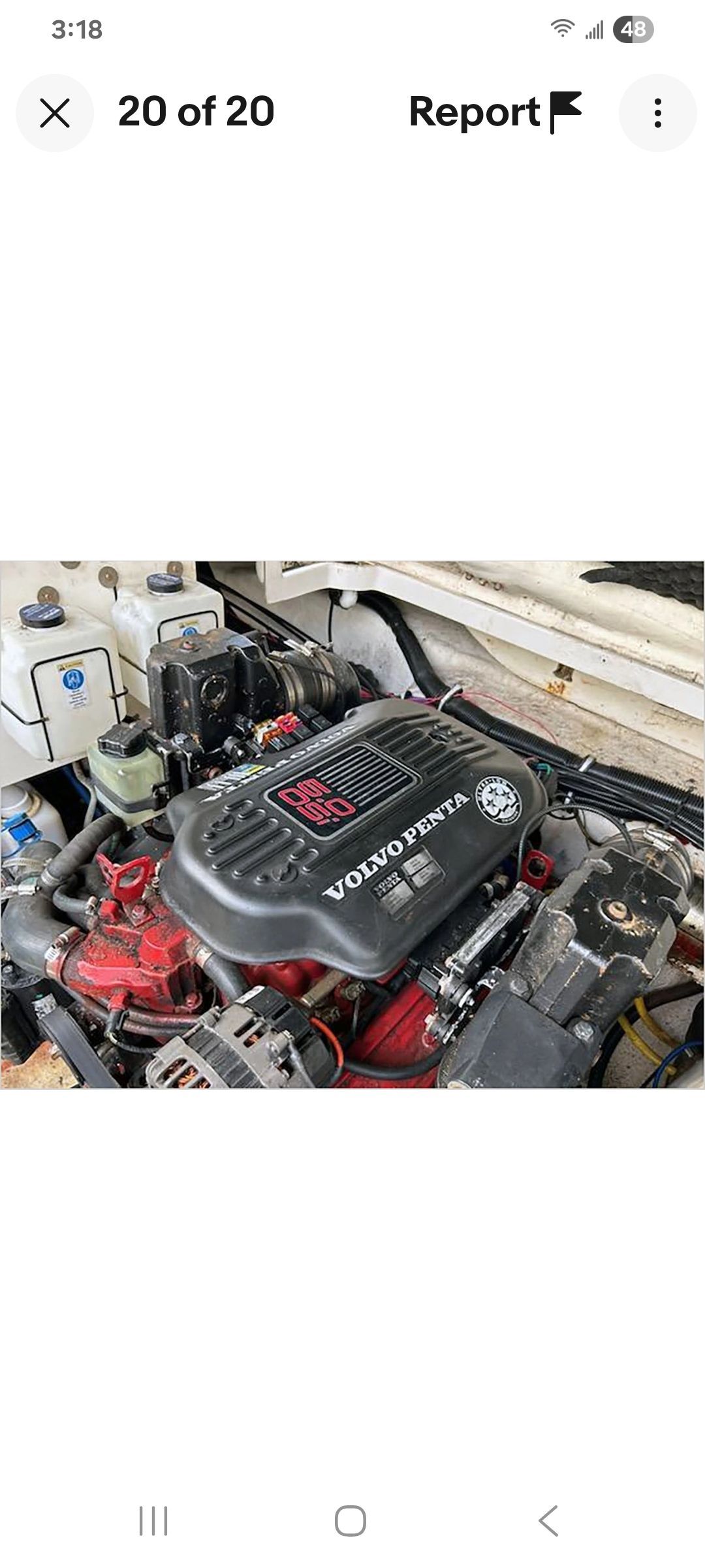 A Volvo Penta engine in a boat's engine compartment.