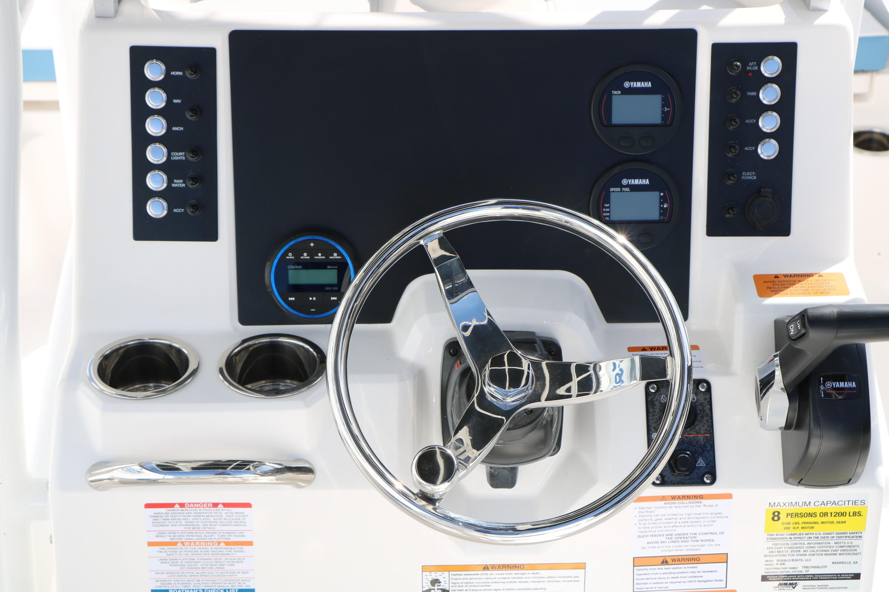 2026 Robalo R200 Center Console dashboard with steering wheel and Yamaha controls.