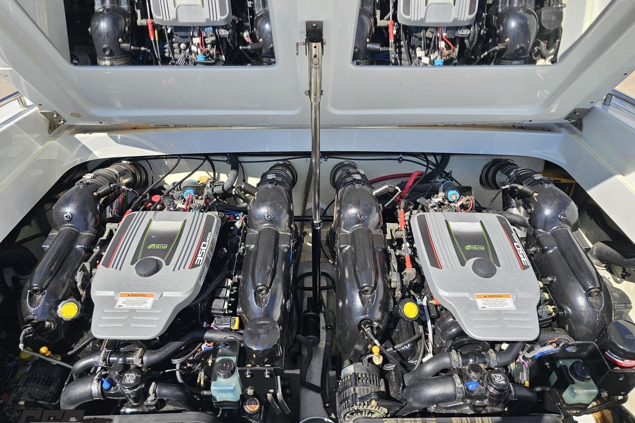 Twin engines of a 2014 Formula 292 FASTech boat, showcasing powerful performance.