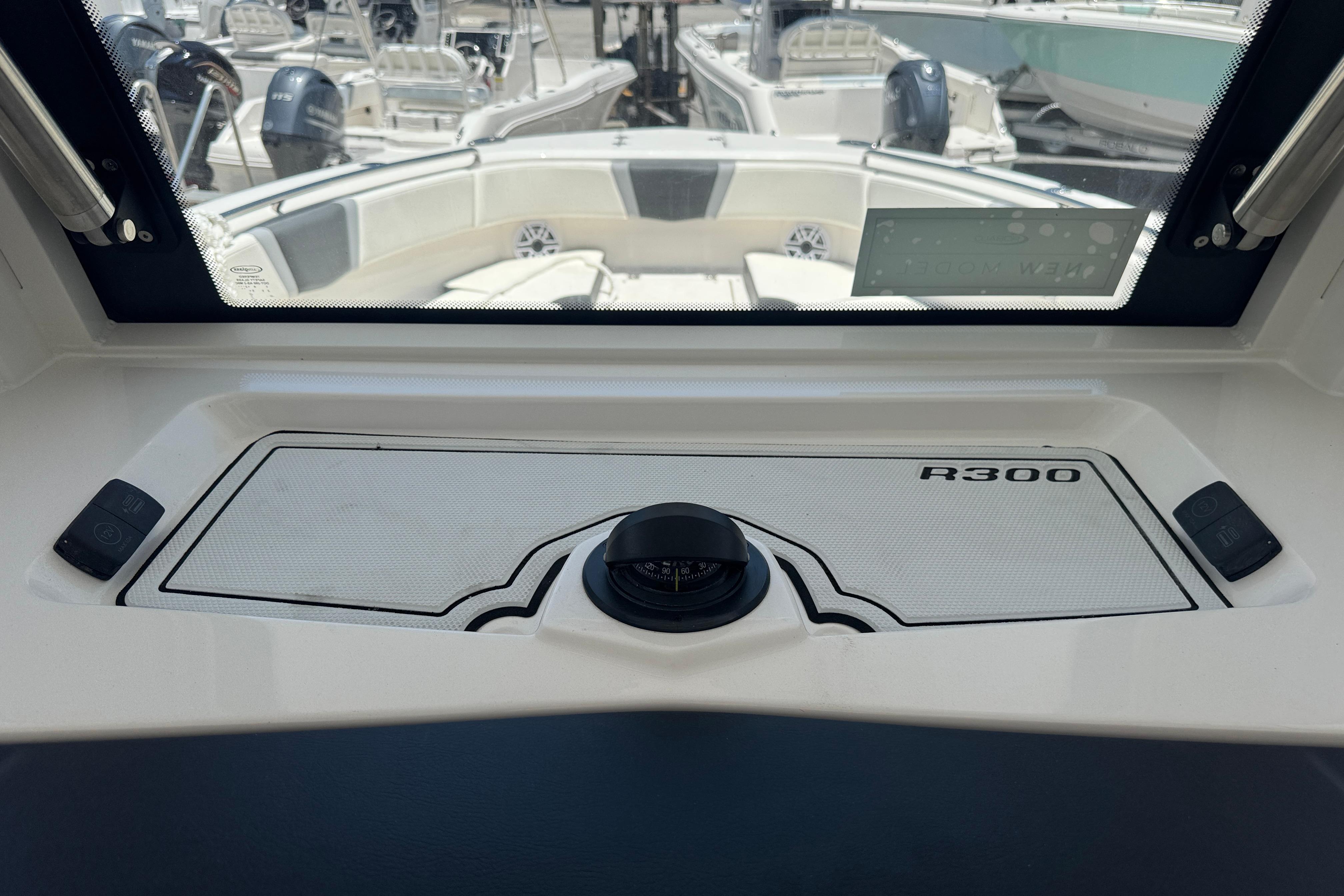 2025 Robalo R300 Center Console boat interior with dashboard view.