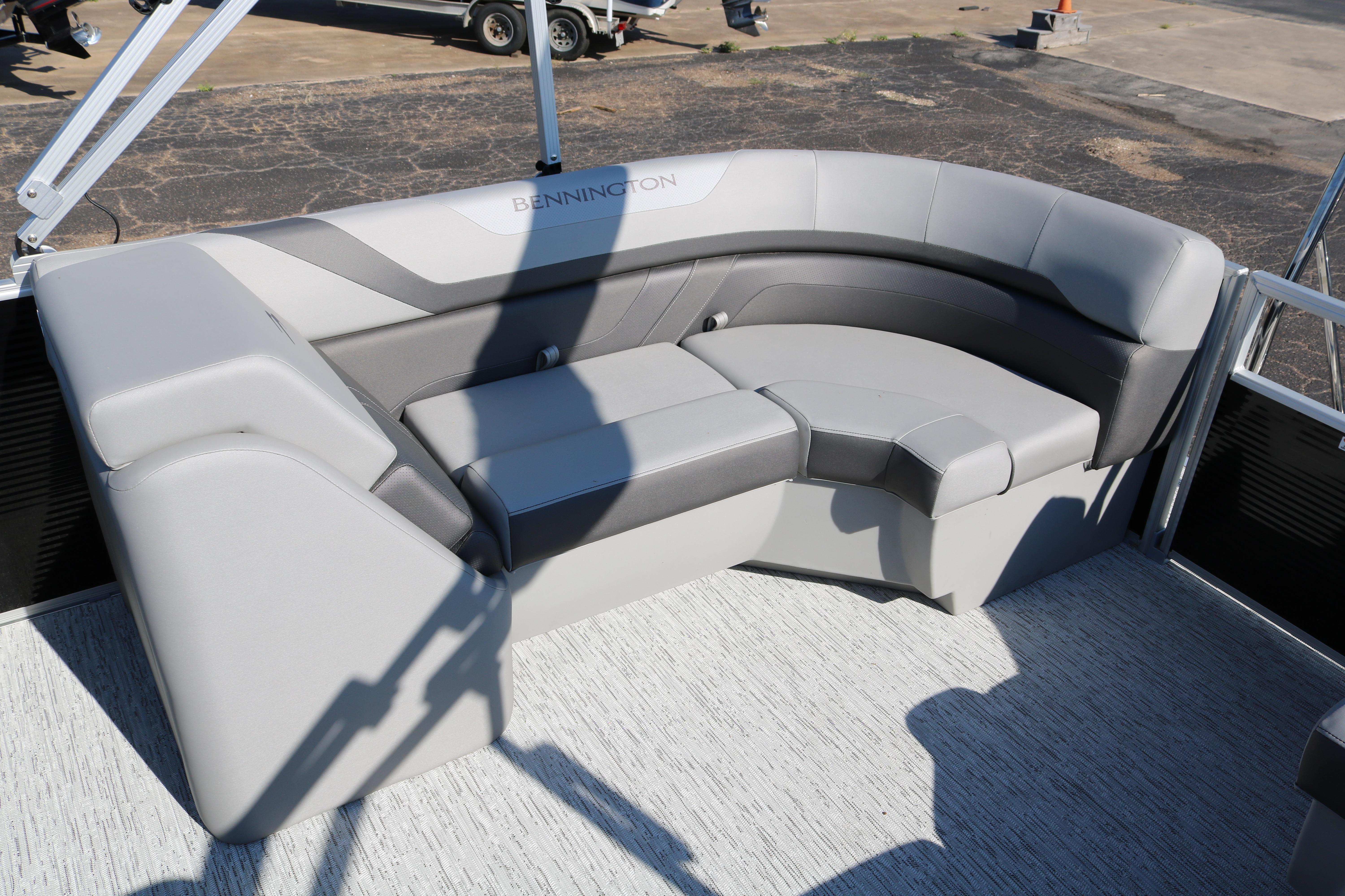 2026 Bennington 22SX Stern Radius boat seating, featuring sleek gray upholstery and modern design.