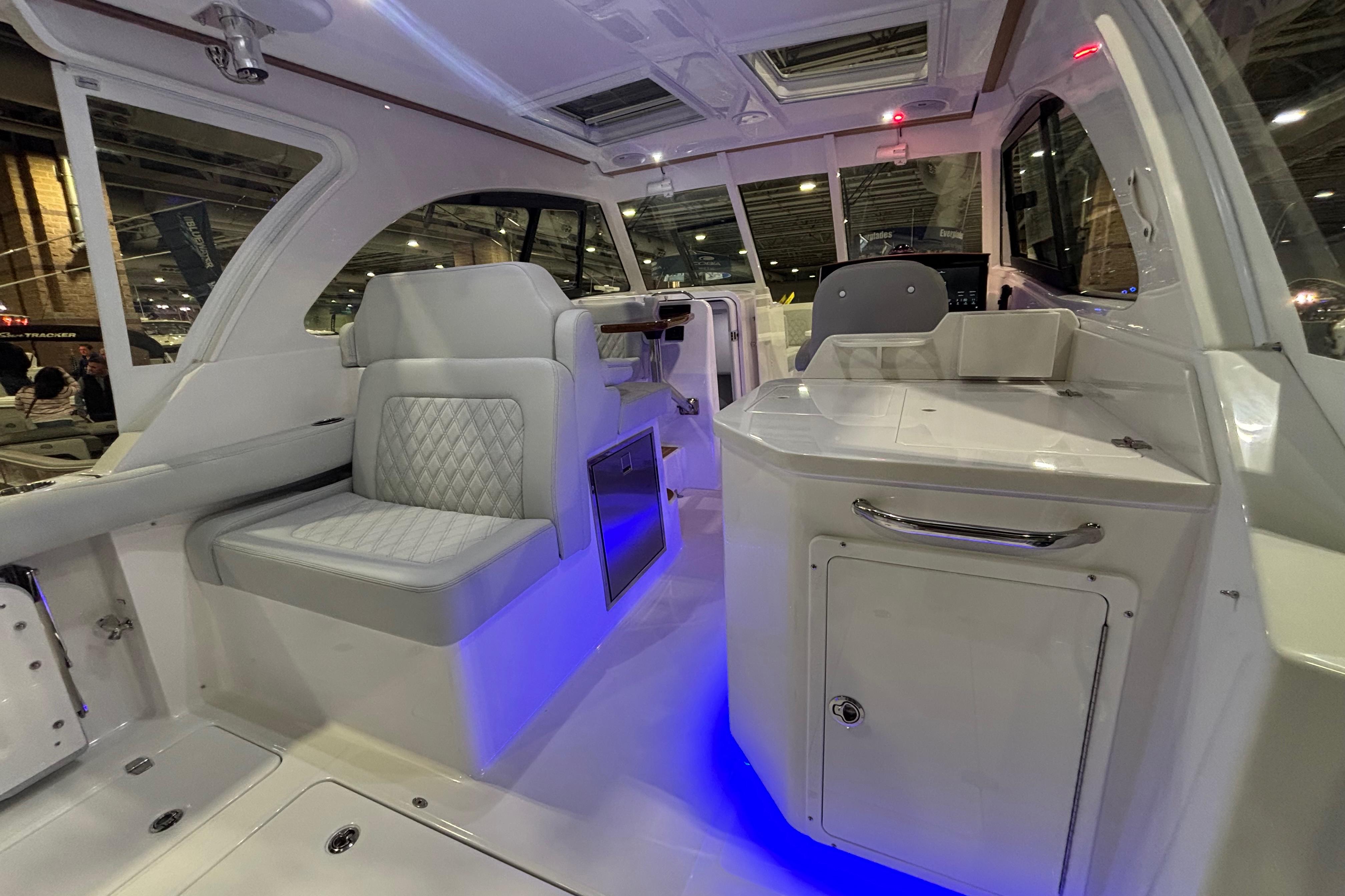 2026 Southport 33 DC boat interior with modern seating and ambient lighting.