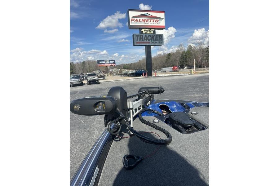 2020 Skeeter FXR21 boat at Palmetto Boat Center with clear blue sky.