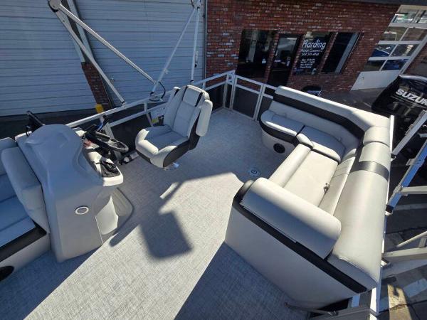 2025 Berkshire 20 CL pontoon boat interior with modern seating and steering console.