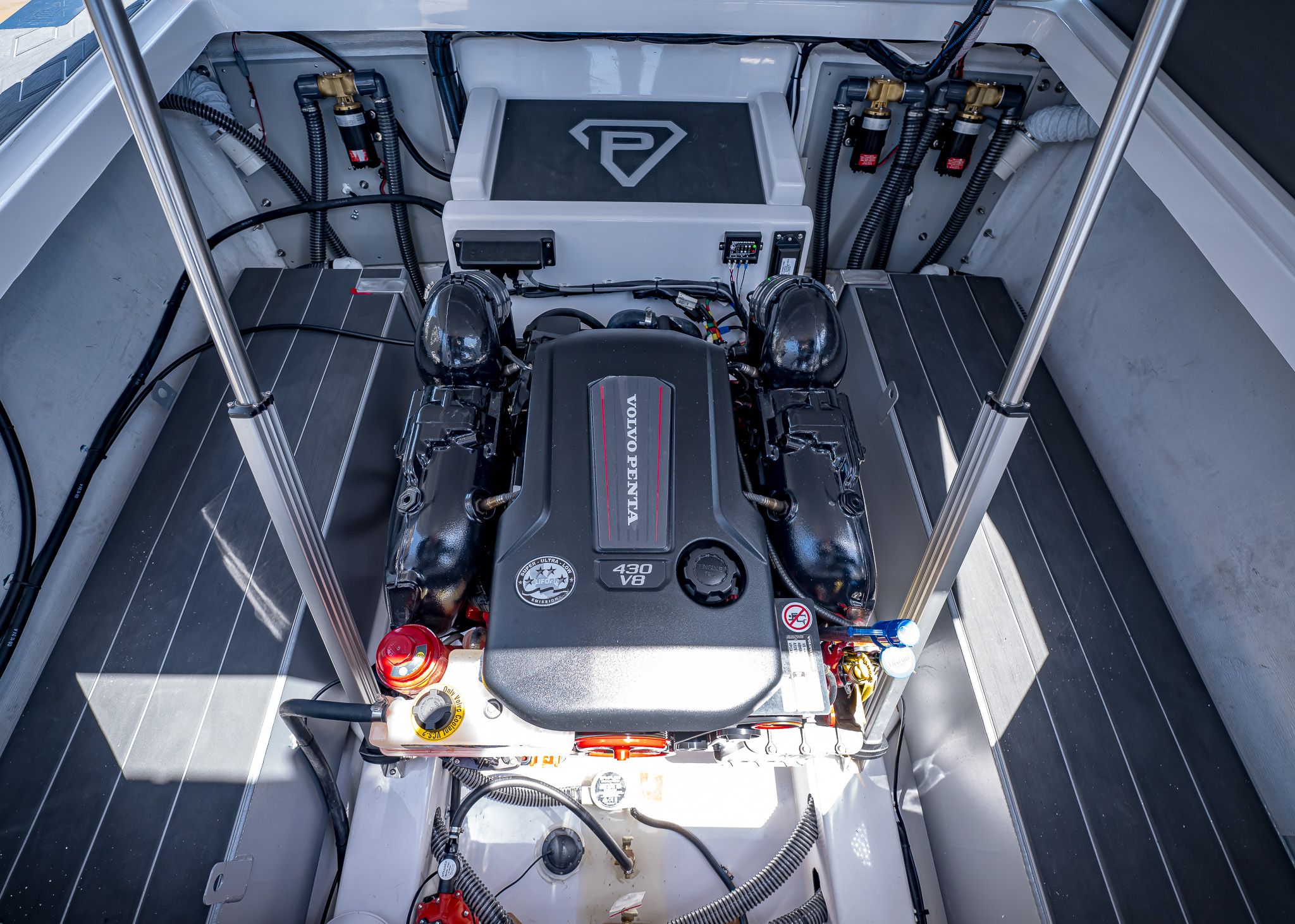 Engine compartment of 2025 Paradigm 266 SL SURF with Volvo Penta 430 V8.