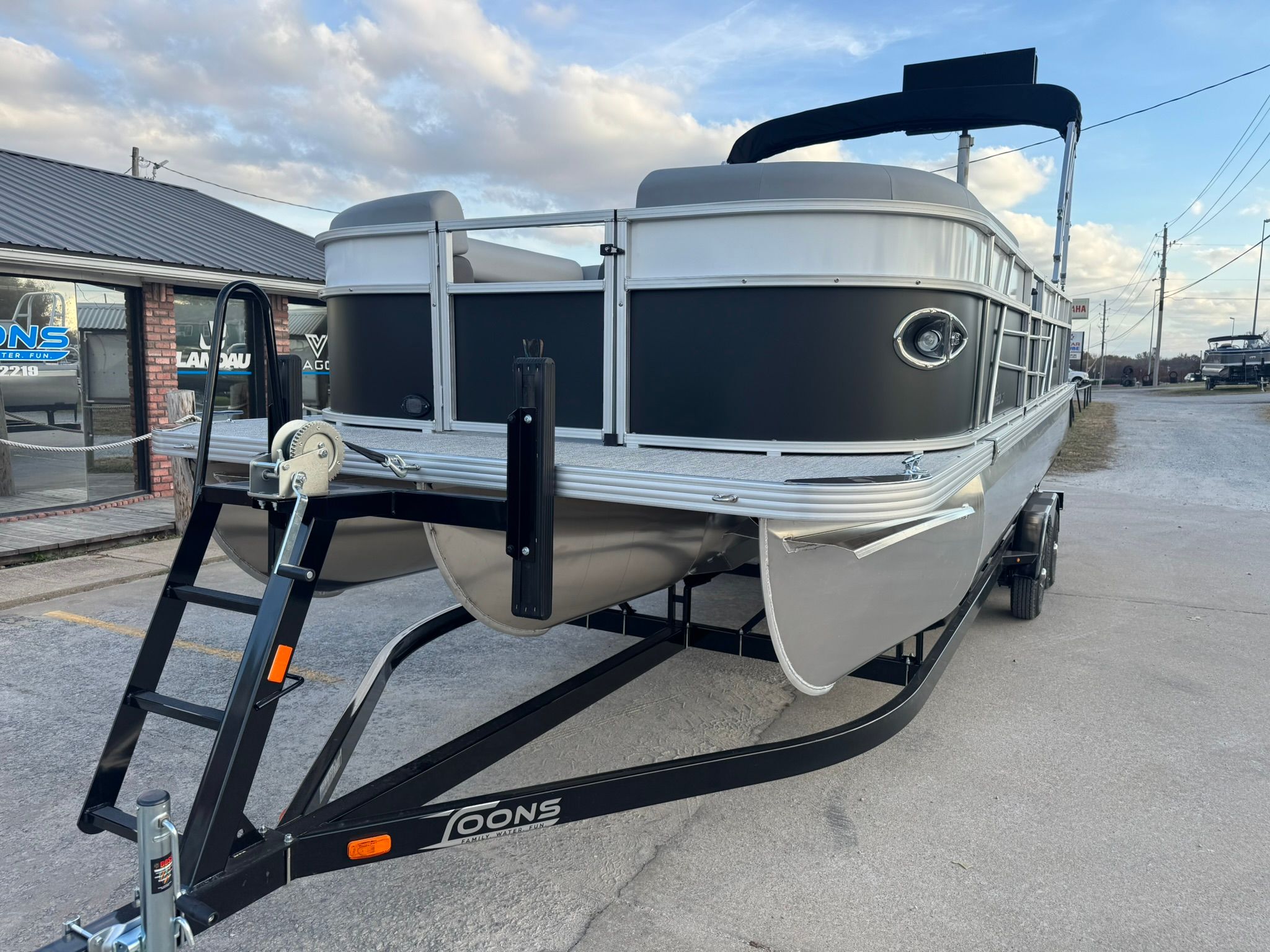 2026 Landau 23 Island Breeze pontoon boat on trailer.