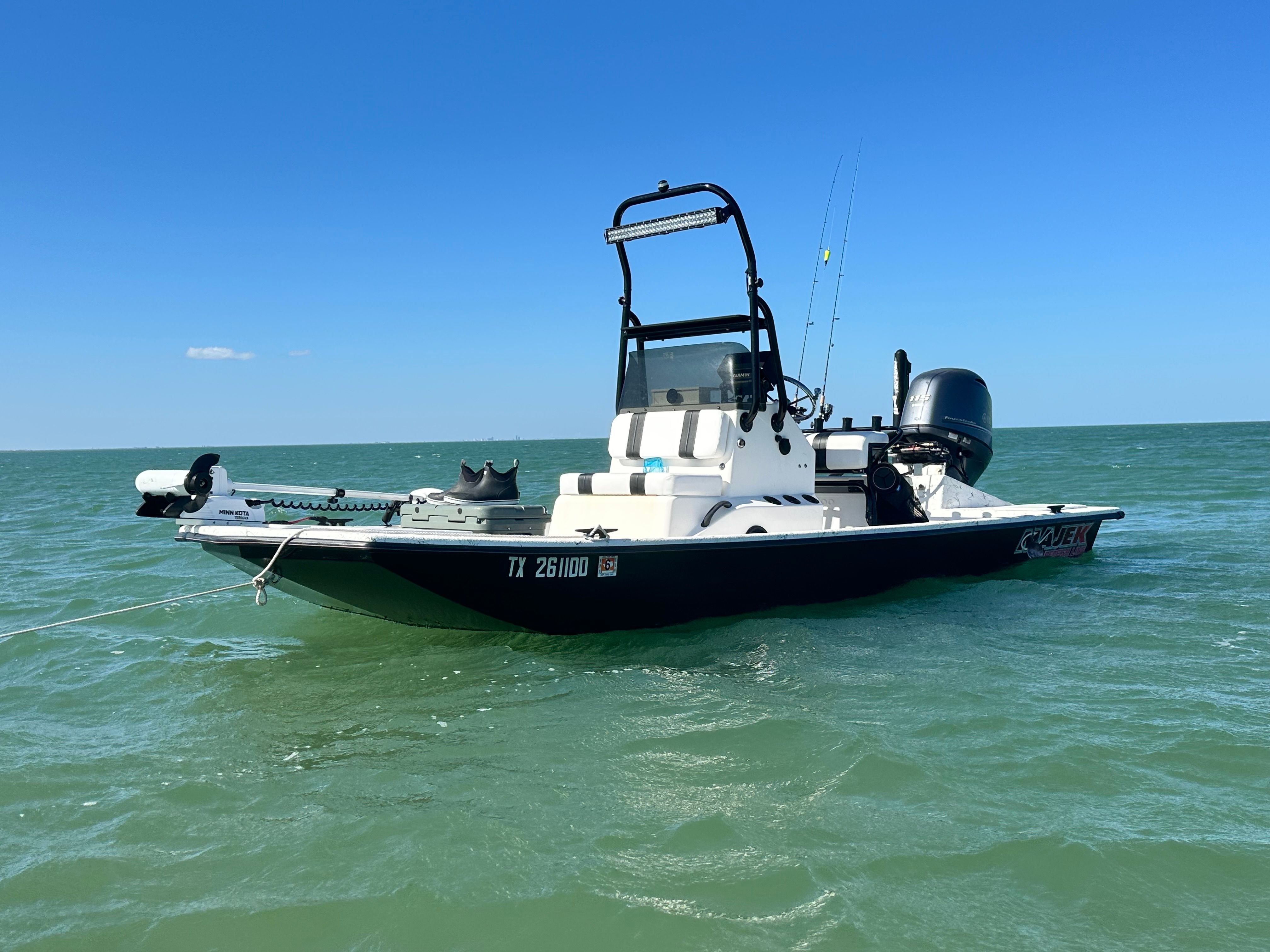 2015 Majek Redfish Line boat on the water.