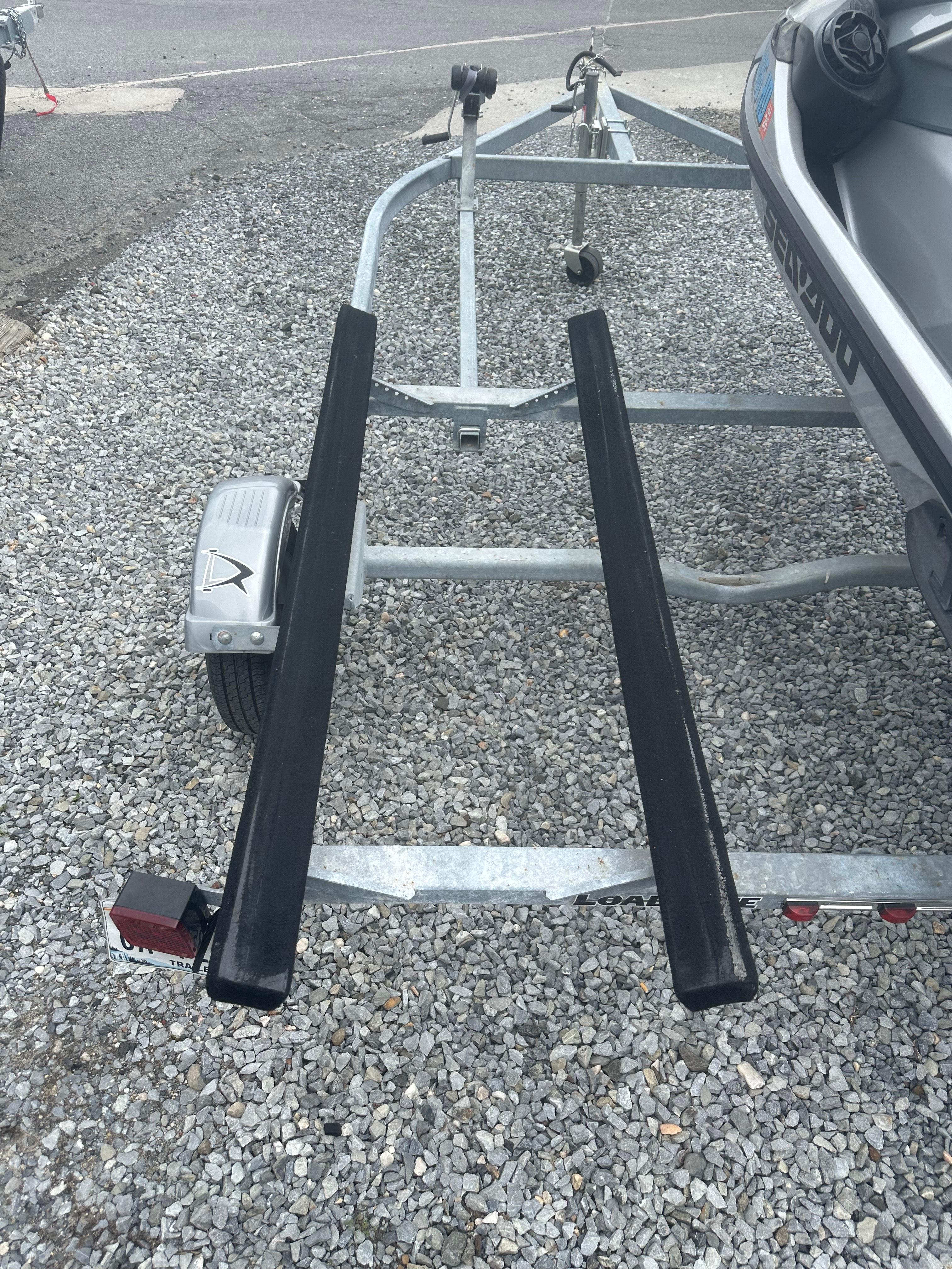 2020 Sea-Doo GTX Limited 300 on a trailer, parked on gravel.