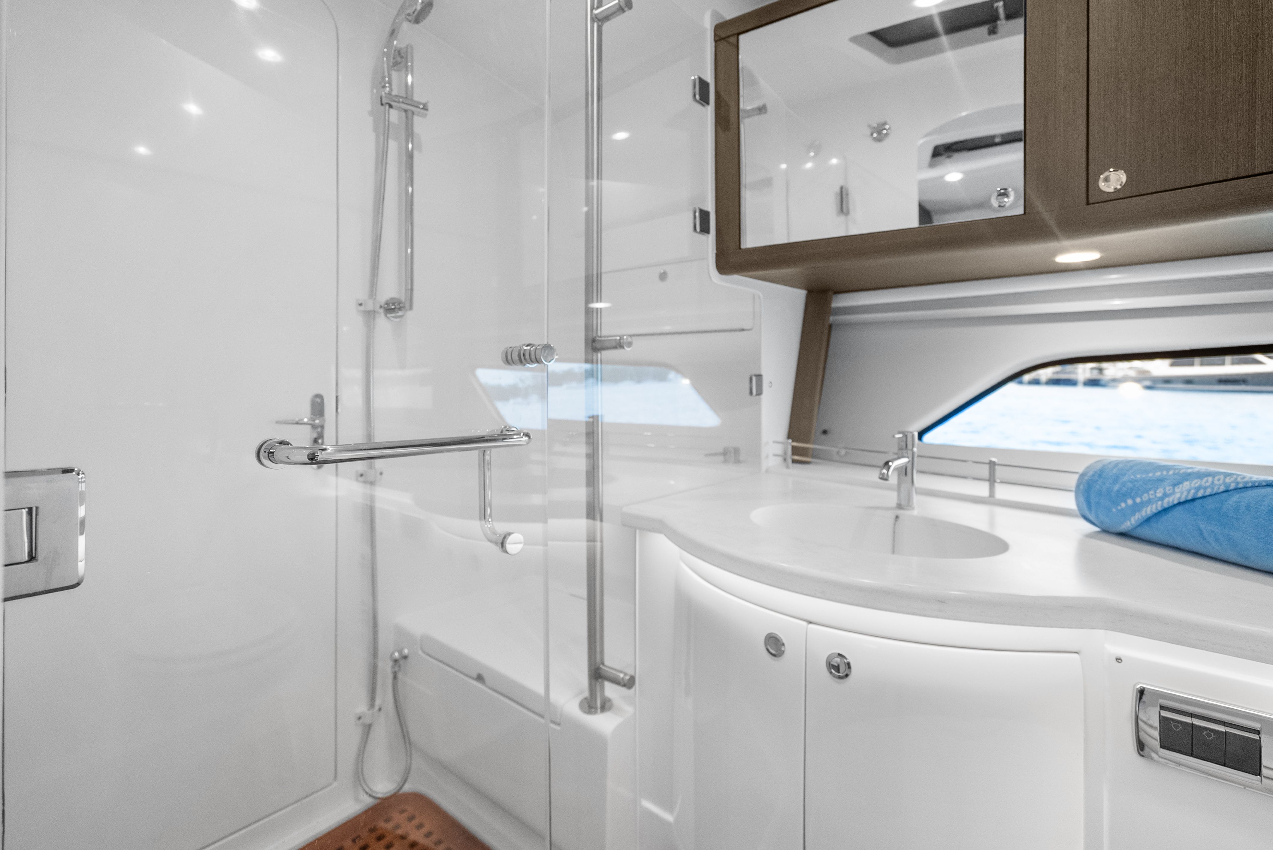 Luxurious bathroom of the 2024 Intrepid 477 Evolution yacht.
