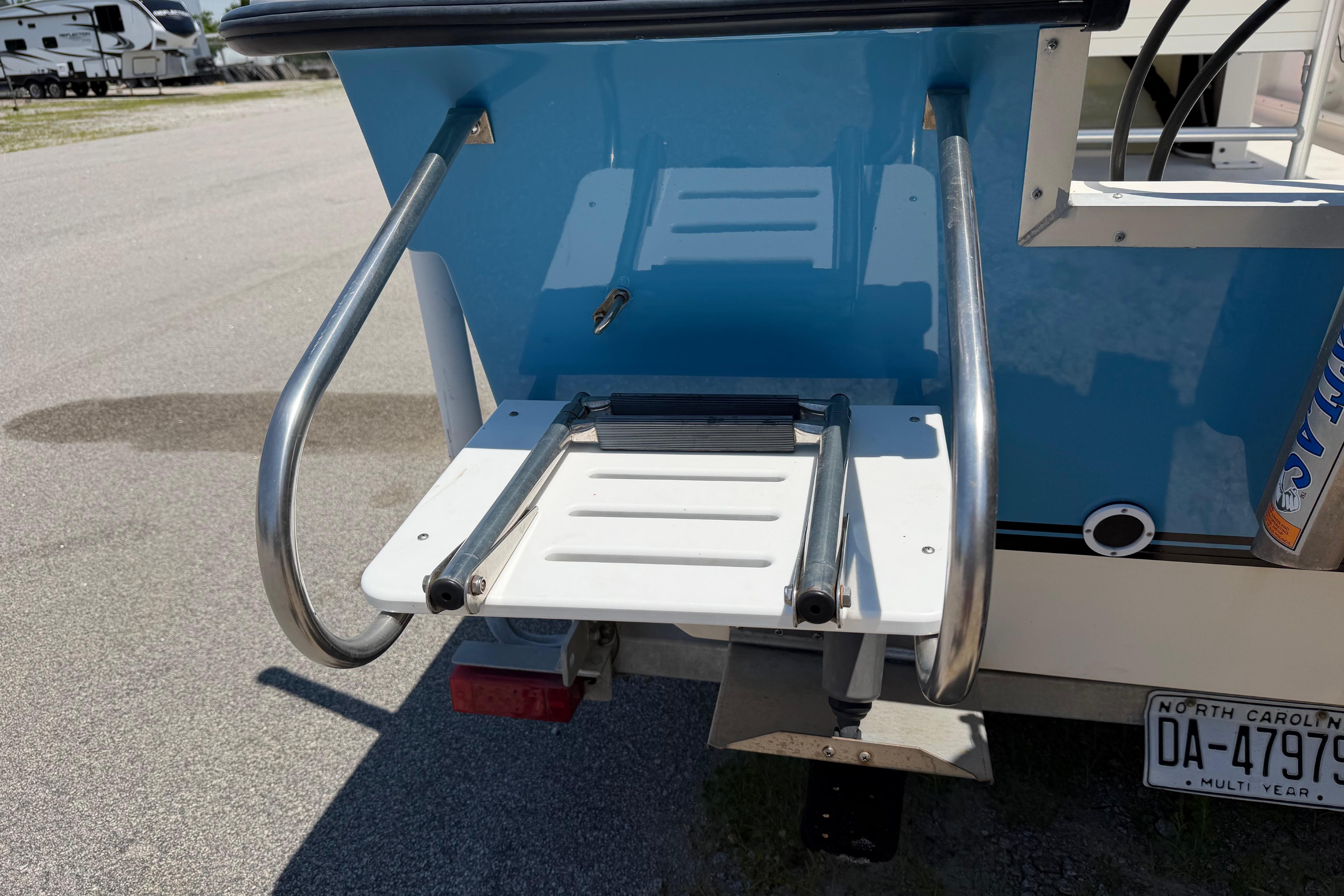 2008 KenCraft Bay Rider 2060 boat with swim platform and ladder.