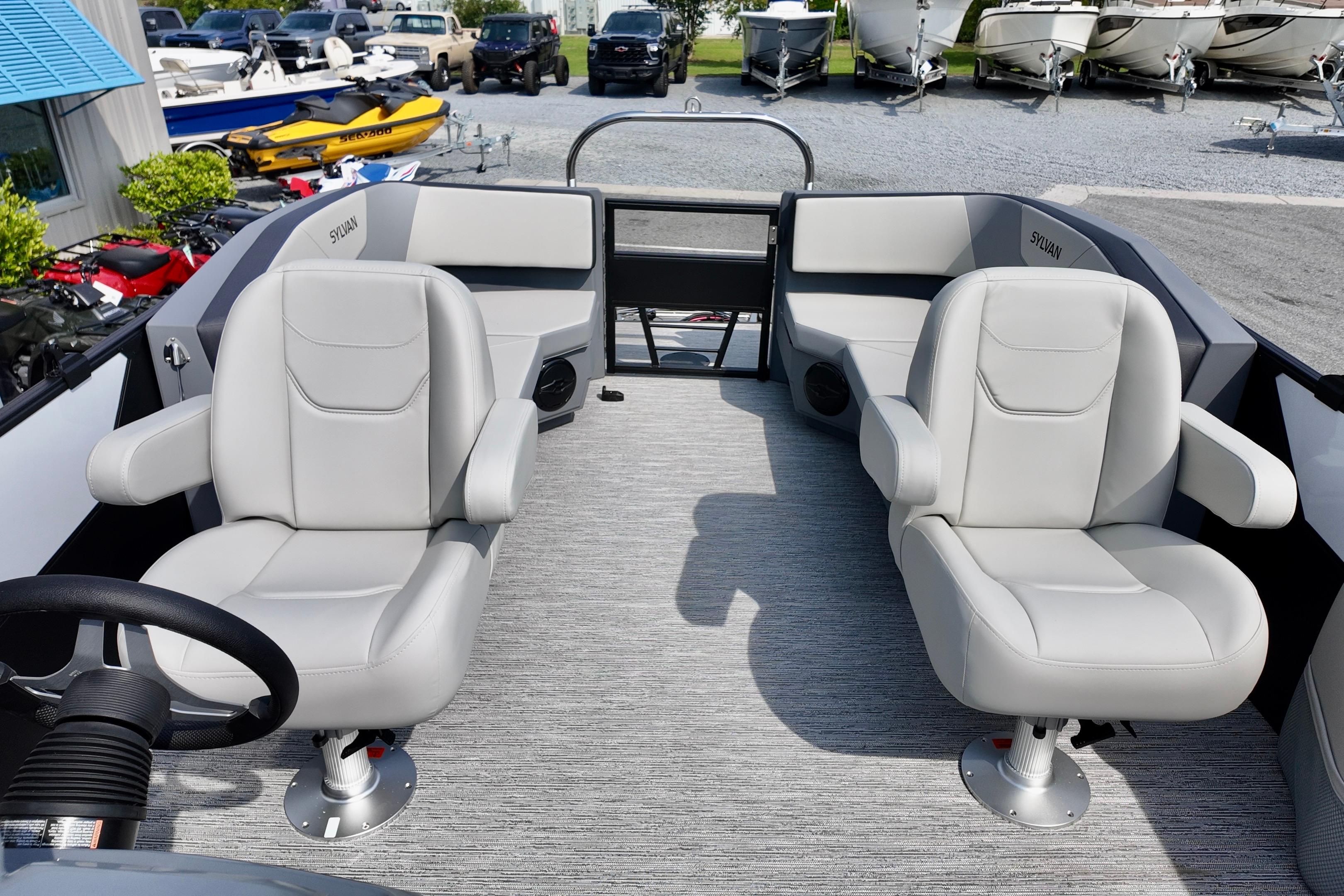 2026 Sylvan A-20 LZ DH boat interior with gray seating and steering wheel.
