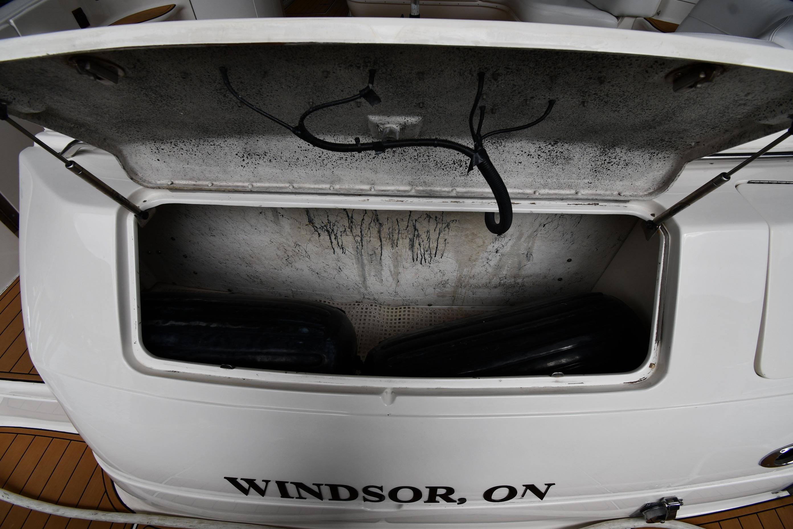 Open storage compartment on a 2001 Sea Ray 540 Sundancer boat, Windsor, ON.