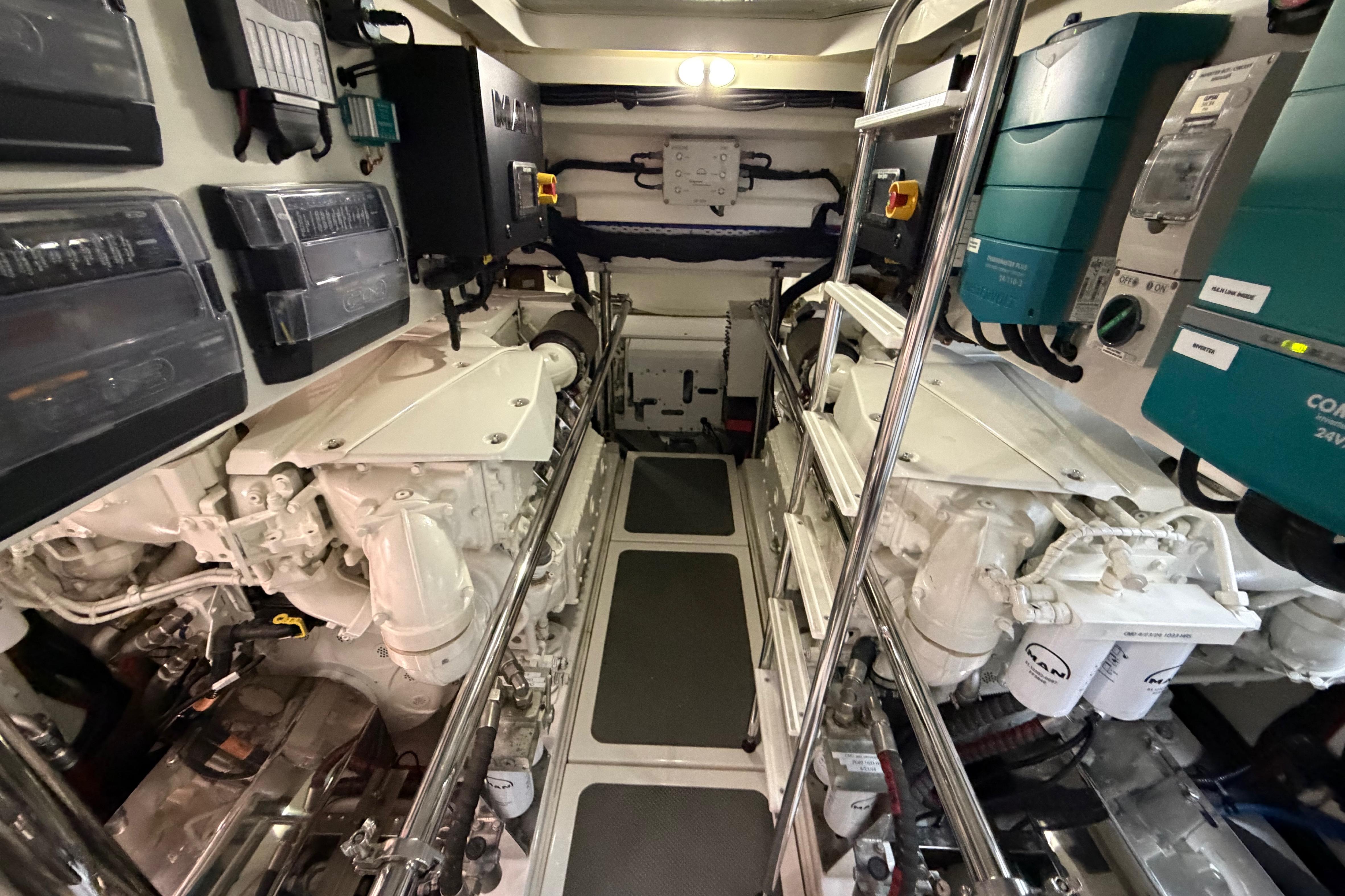 Engine room of 2023 Riviera 645 SUV yacht, featuring advanced machinery and equipment.