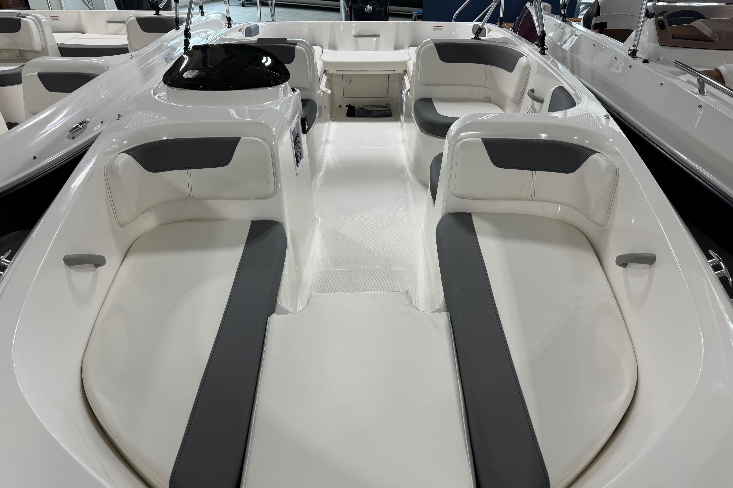 2025 Bayliner Element E18 boat interior with spacious seating and modern design.