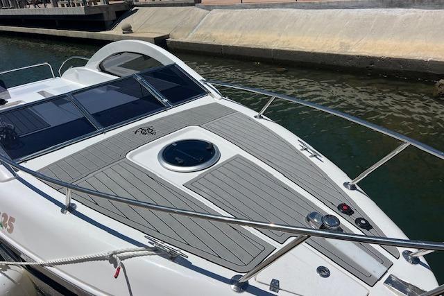 2024 Bracewell 25 boat docked, featuring sleek design and modern deck layout.
