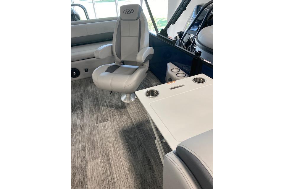 2026 Bentley Pontoons Legacy 243 Swingback interior with gray seating and table.