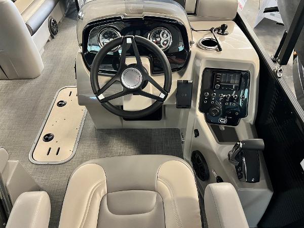 2024 Princecraft Quorum 23 RL boat interior with steering wheel and control panel.
