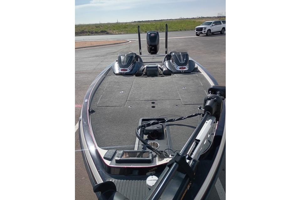 2017 Ranger Z521 Comanche Cup-Equipped boat on a sunny day, parked on pavement.