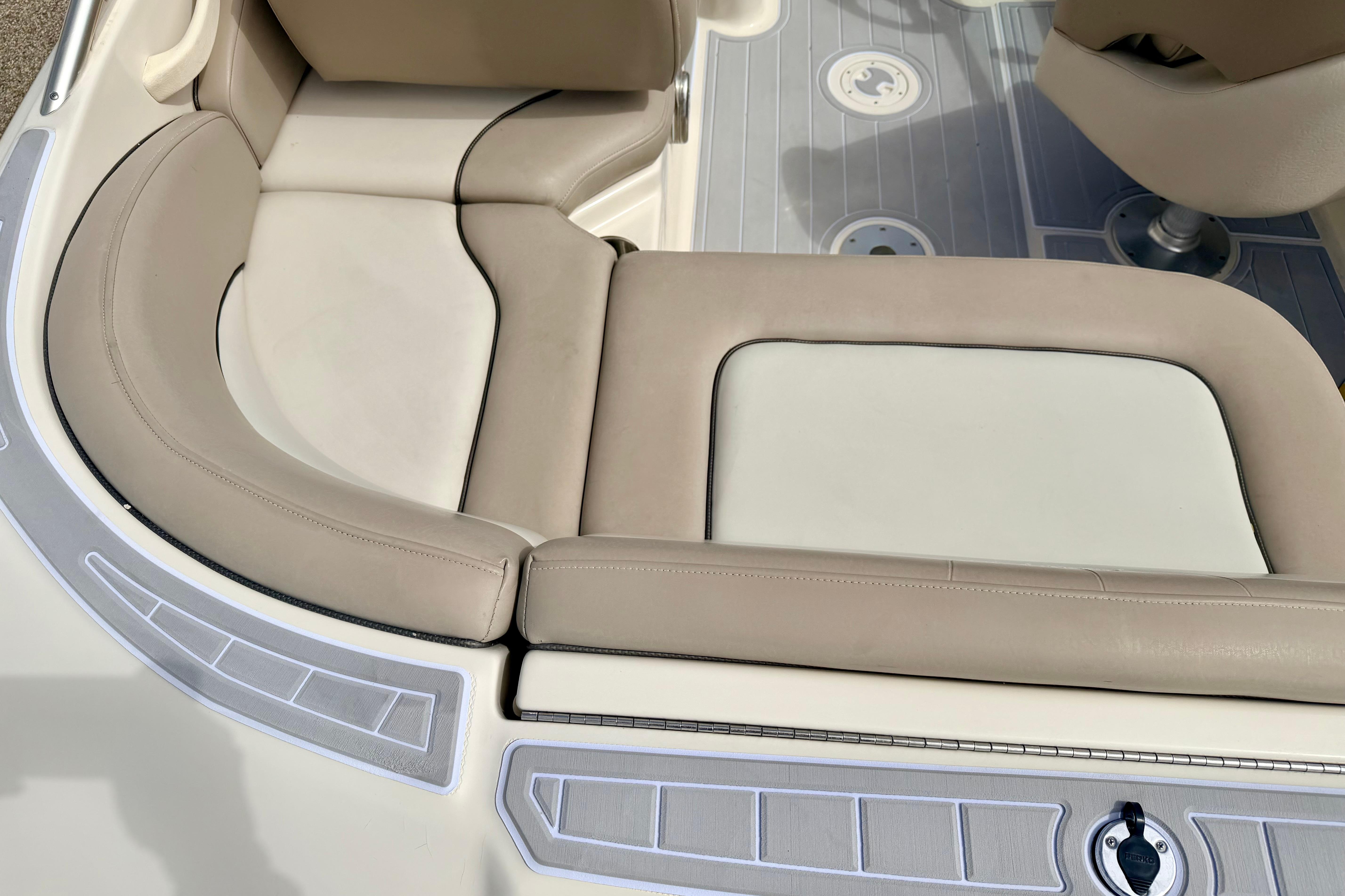 Beige seating area on a 2003 Sea Ray 200 Sundeck boat.
