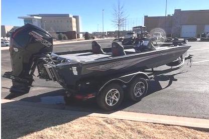 Ranger RT188P 2026 boat on trailer in a parking lot.