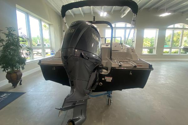 2024 Starcraft SVX 190 boat with Yamaha outboard motor in showroom.